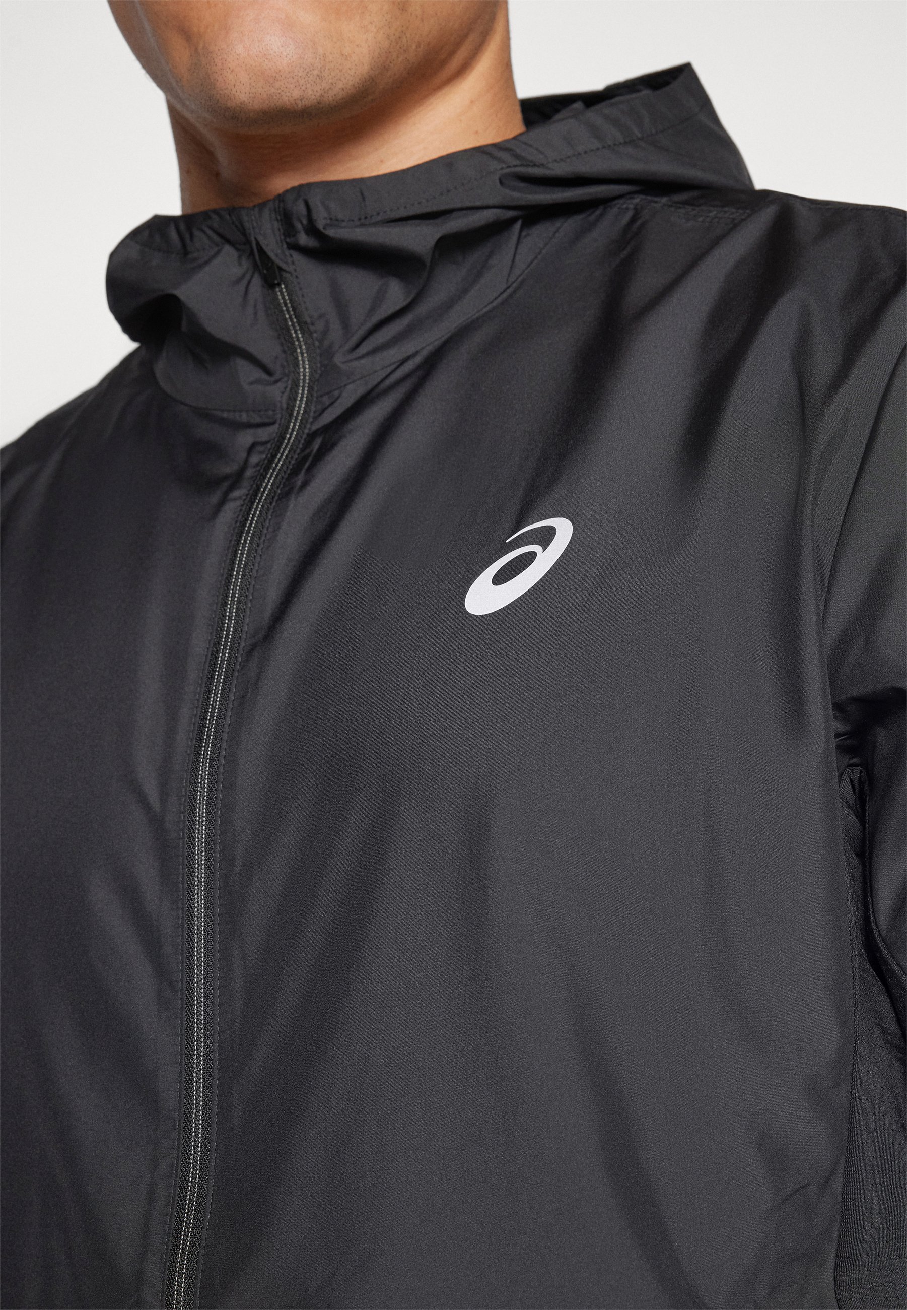 ASICS CORE JACKET - Giacca a vento - nera performante