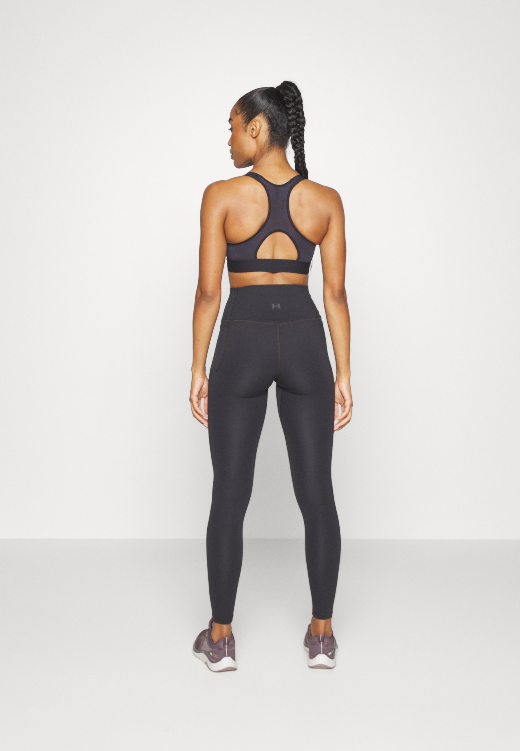Under Armour MERIDIAN - Leggings - zwart