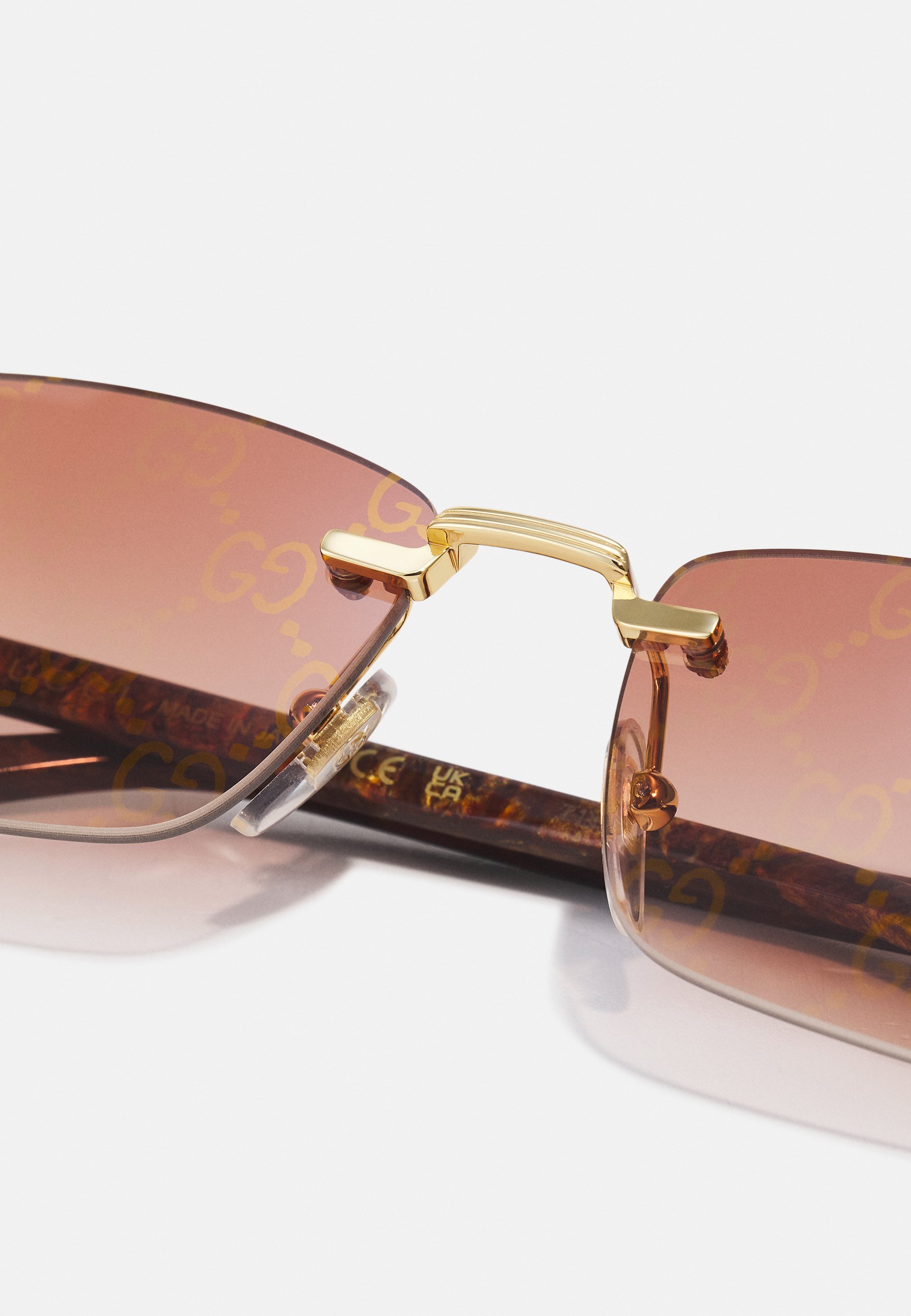 Gucci UNISEX - Zonnebril - goudkleurig/geelrood