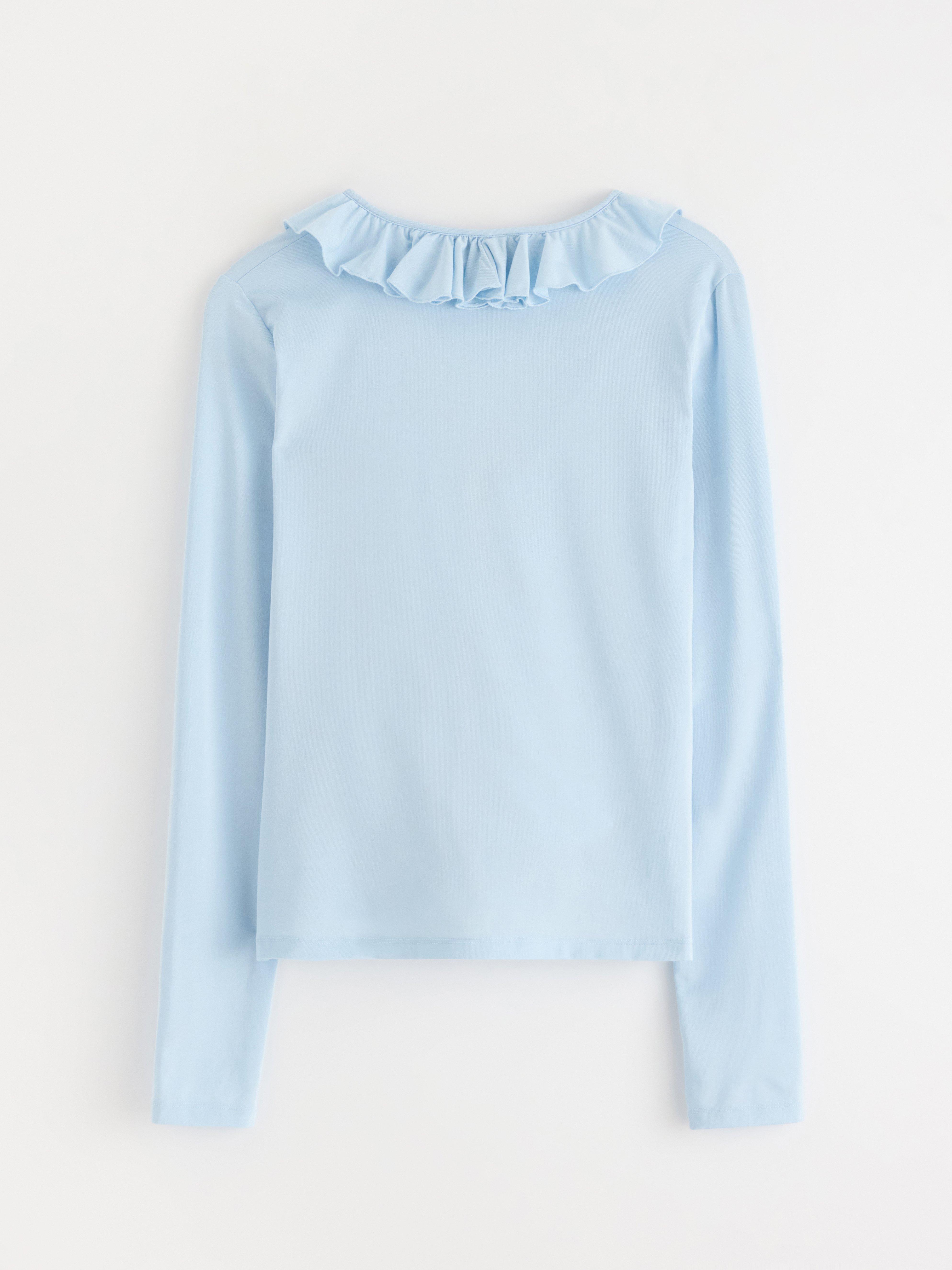Blusa com babados azul claro