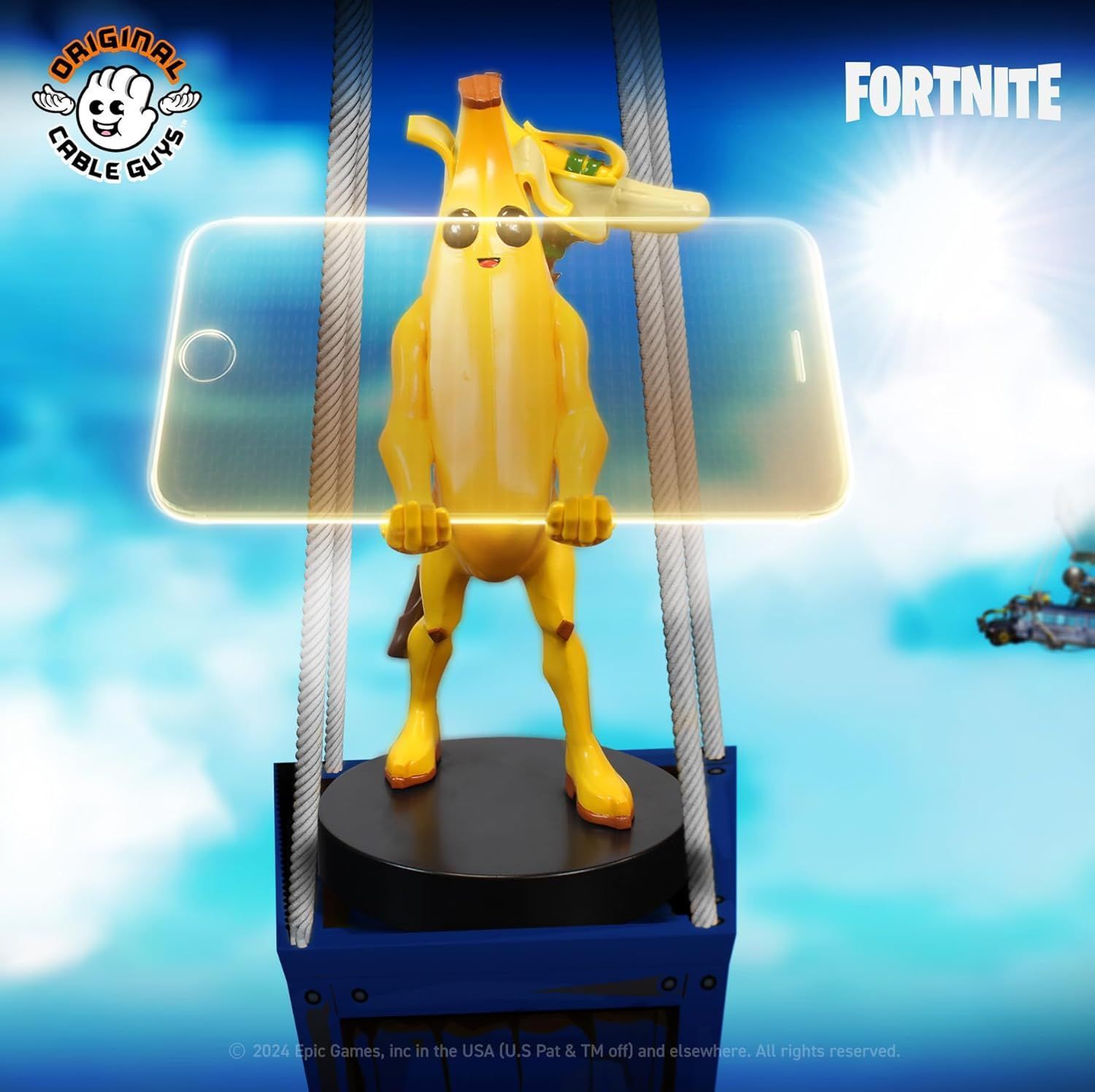 Figura de Peely de Fortnite - EXQUISITE GAMING - Cable Guys - Soporte para auriculares, smartphone o accesorios pequeños - 20 cm