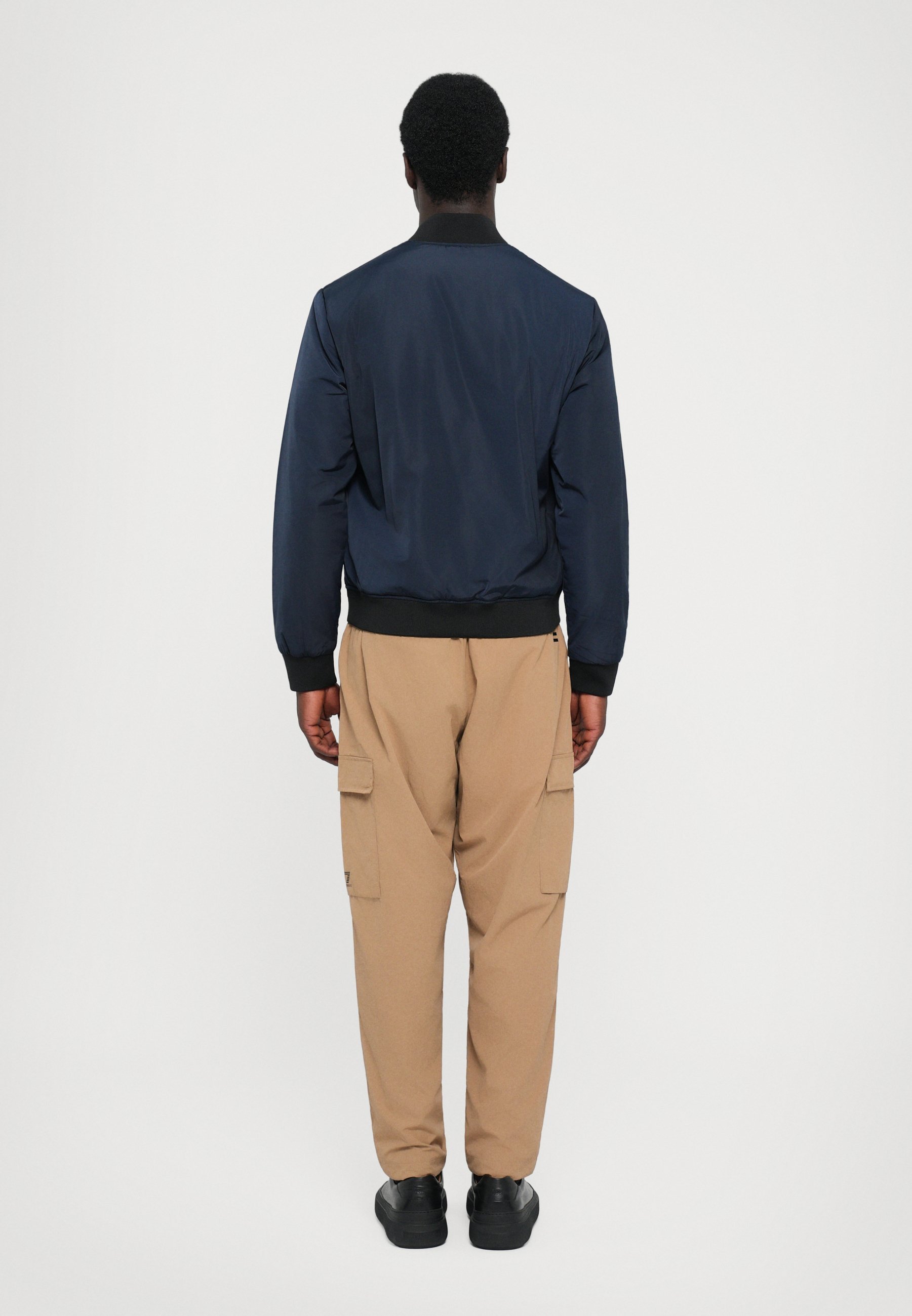 EA7 Emporio Armani TRAIN PREMIUM JACKET - Lichte jas - blauw