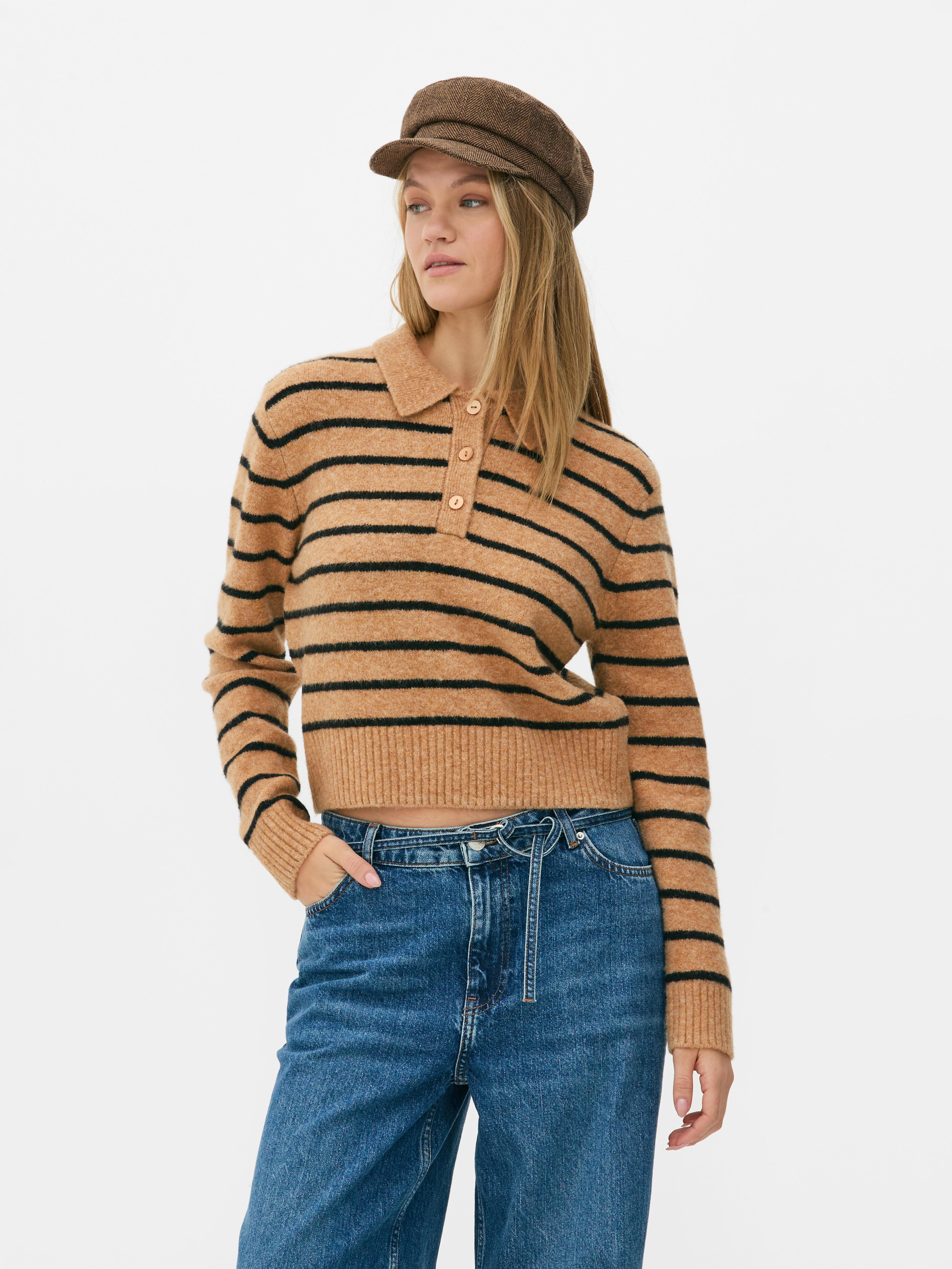 Neulepusero poolokauluksella Pehmeä neulepusero poolokauluksella ja nappilistalla mukavaan preppy-lookiin.