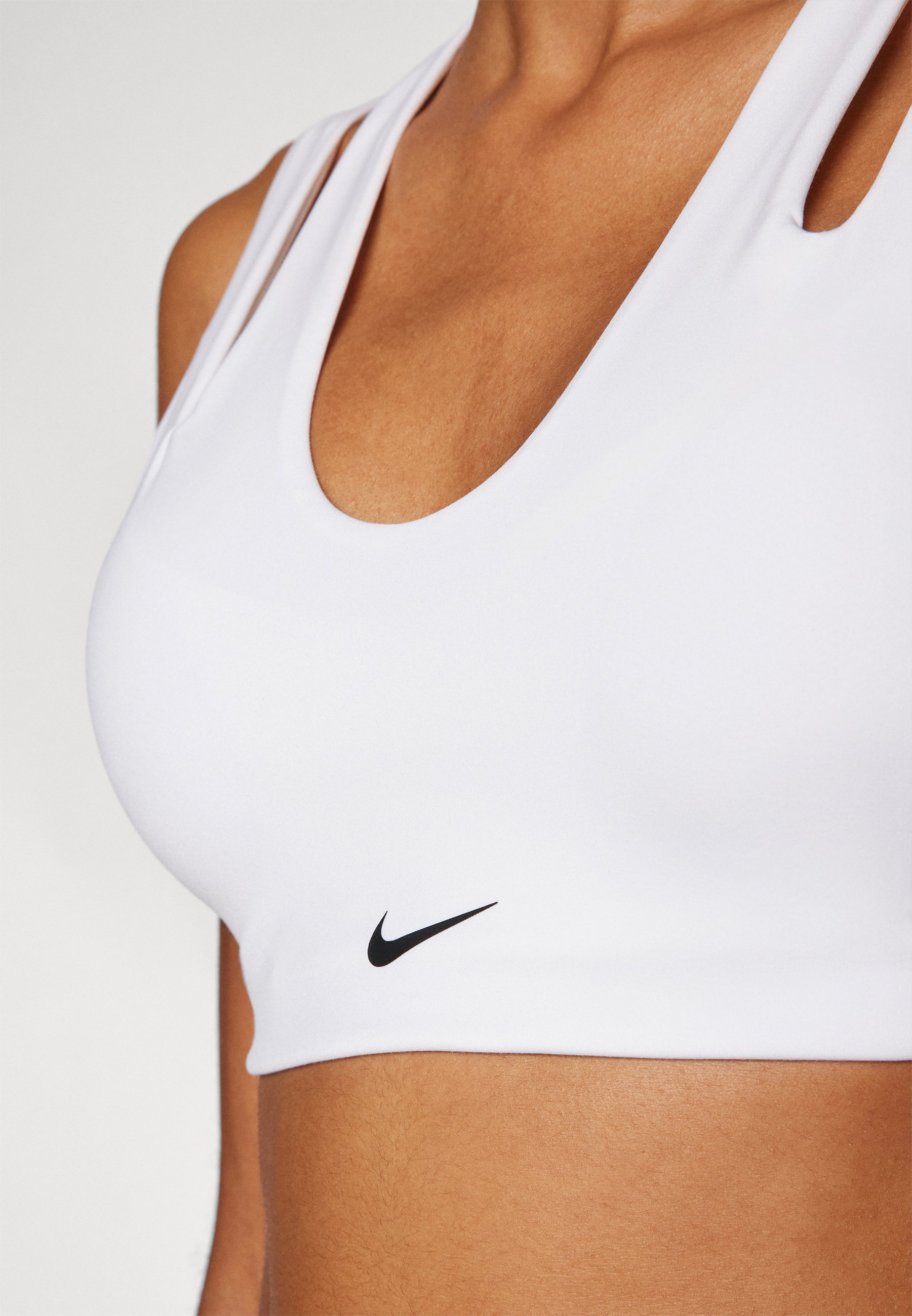 Soutien-gorge de sport Nike Performance INDY FREESTYLE - Maintien léger - Blanc/Noir