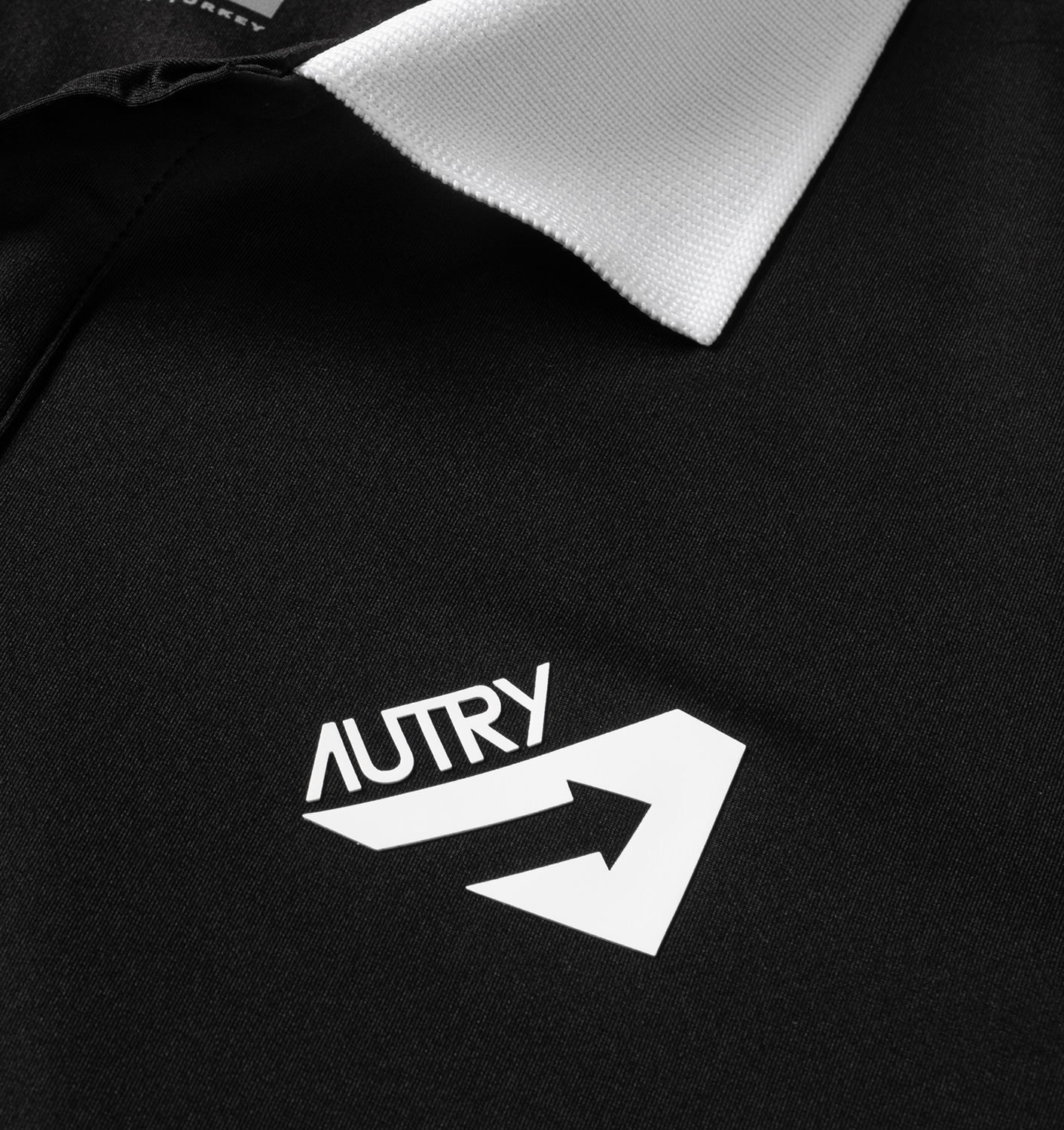 TRICOU DE GOLF NEGRU CU GUARNIȚII CONTRASTANTE