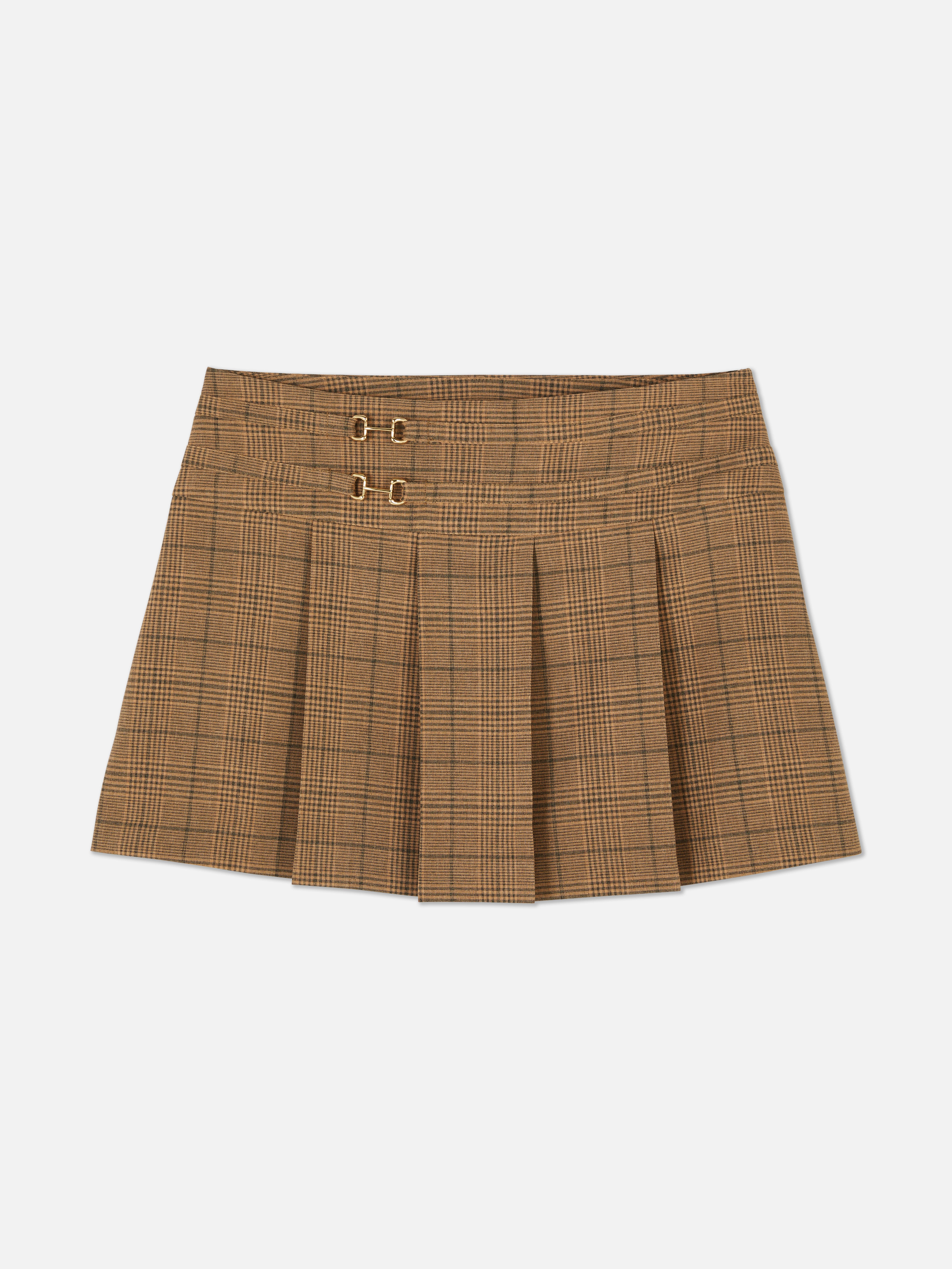 Pleated mini skirt A pleated mini skirt with metallic bit details