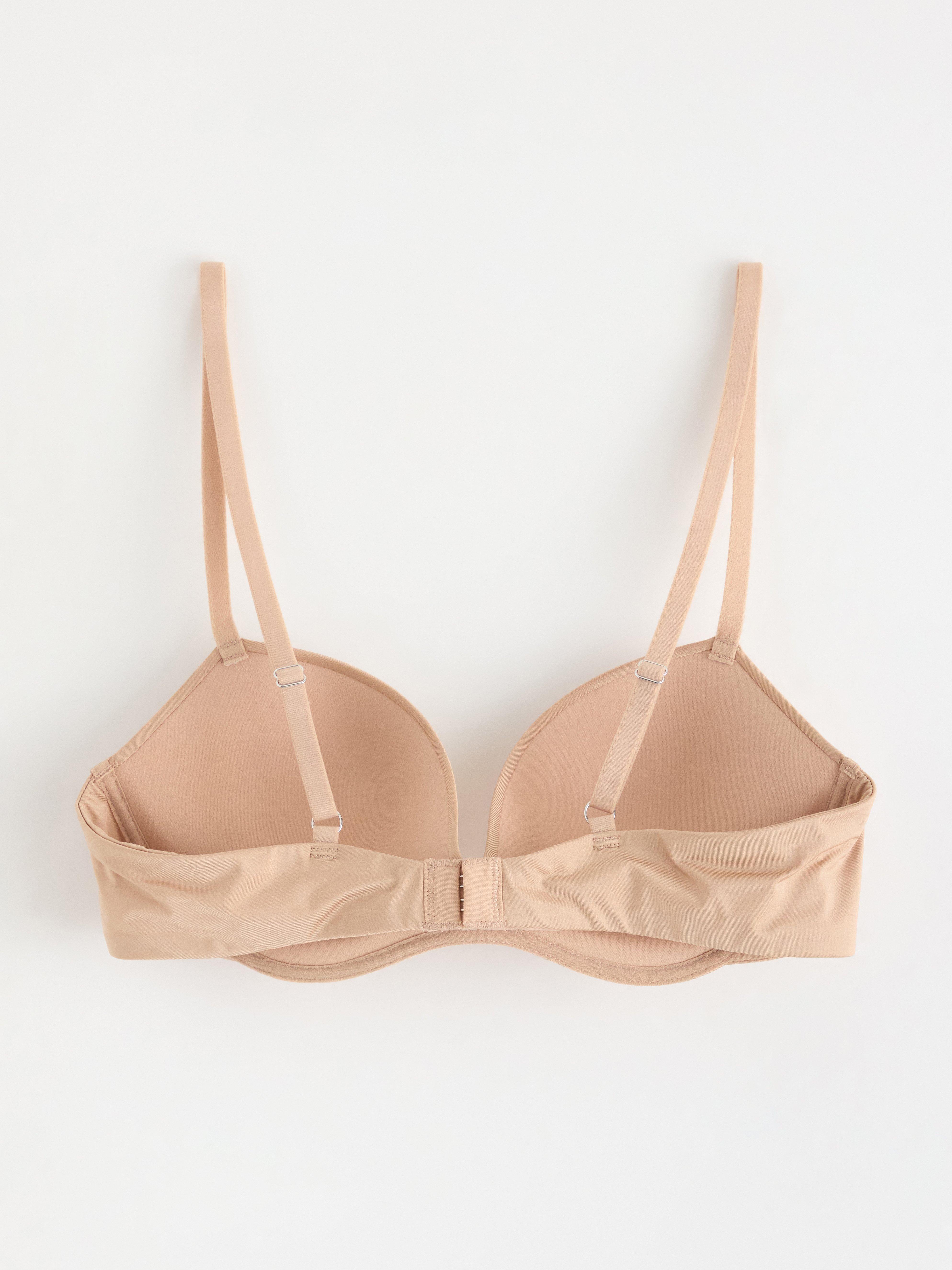 Sujetador Bygellös con efecto push-up, color beige.