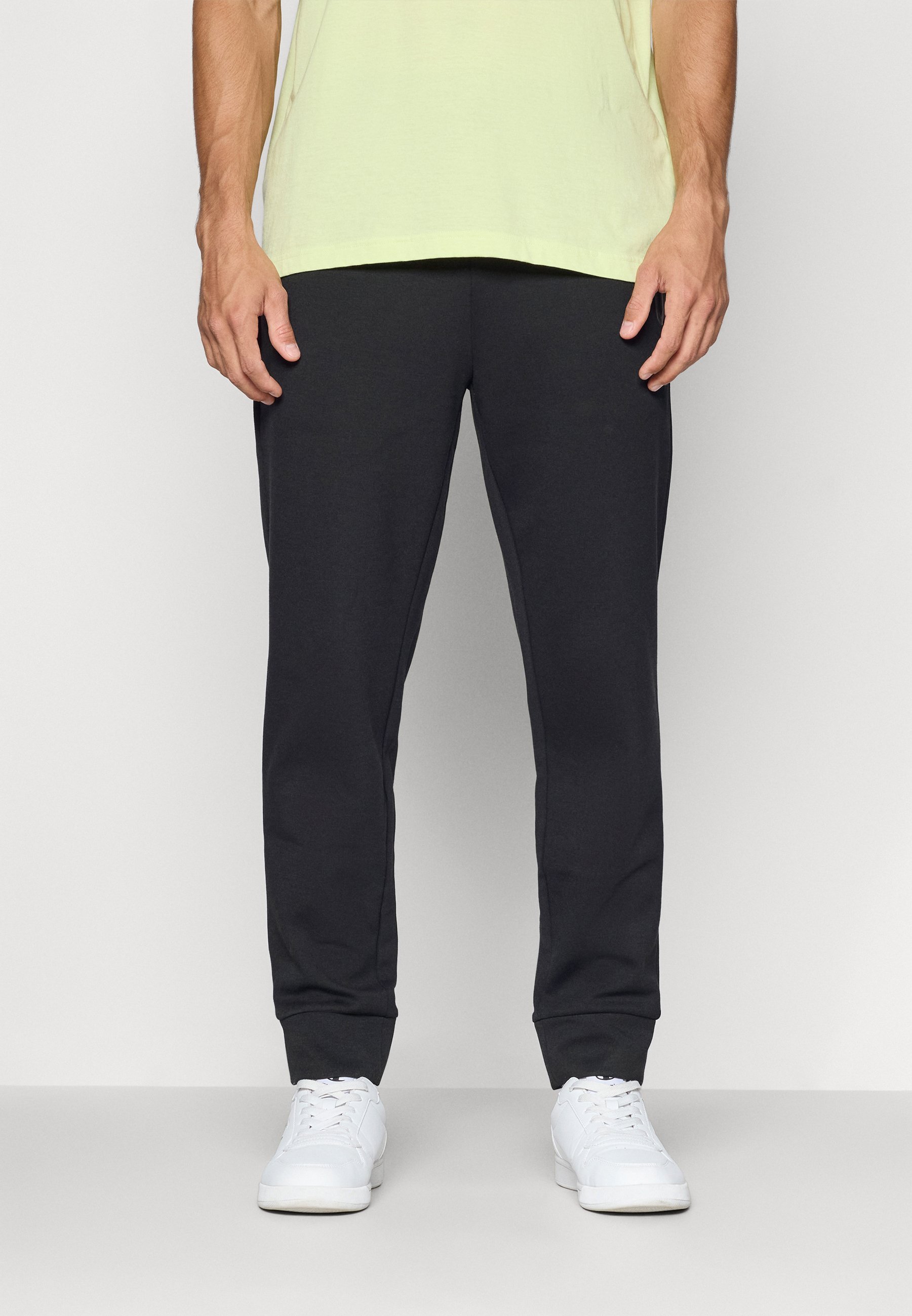 Champion C-TECH CUFFED PANTS - Spodnji del trenirke - črn