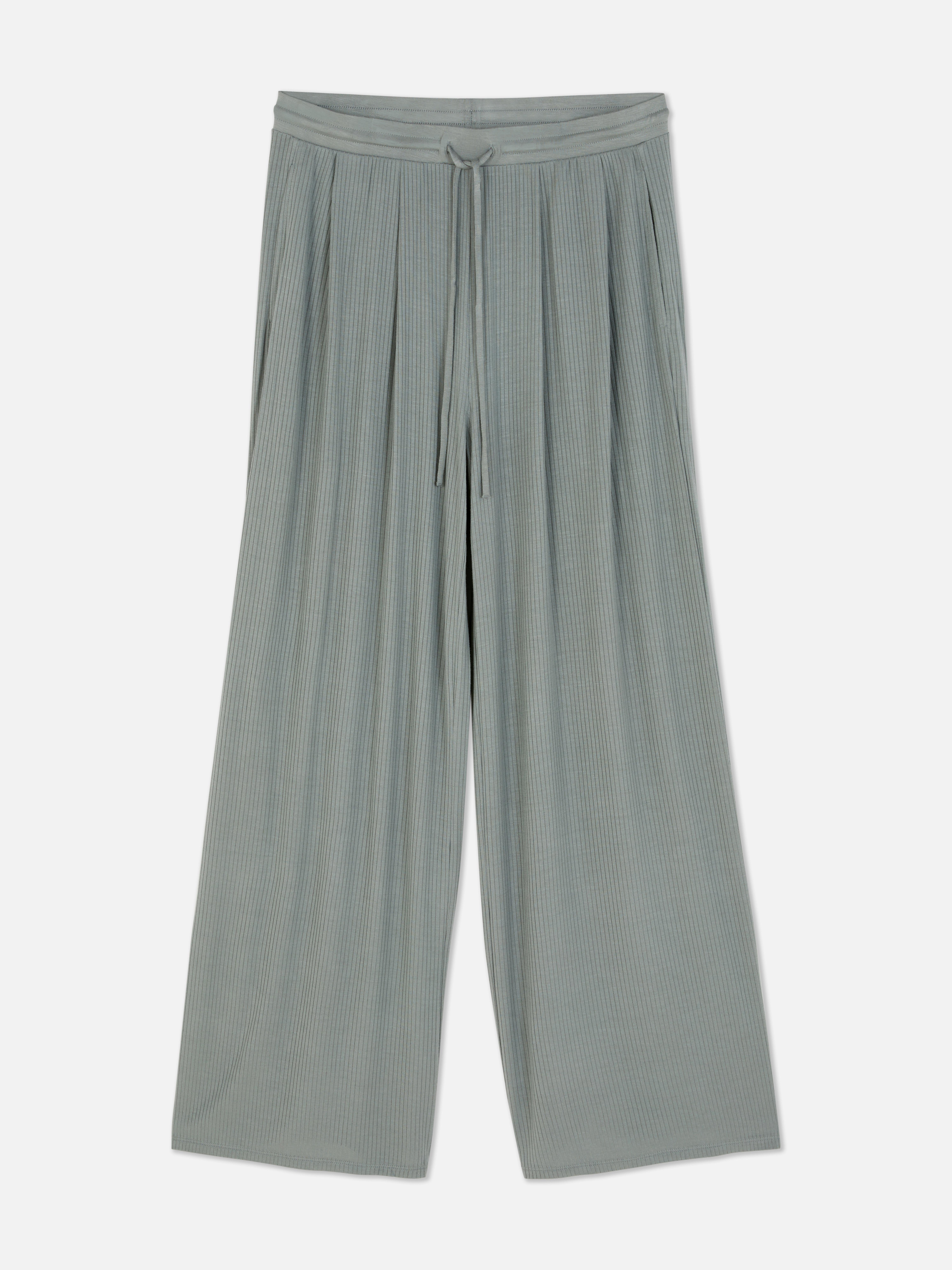 Pantaloni de pijama texturați cu nervuri. Acești pantaloni de pijama cu croi larg combină fără efort stilul și confortul.