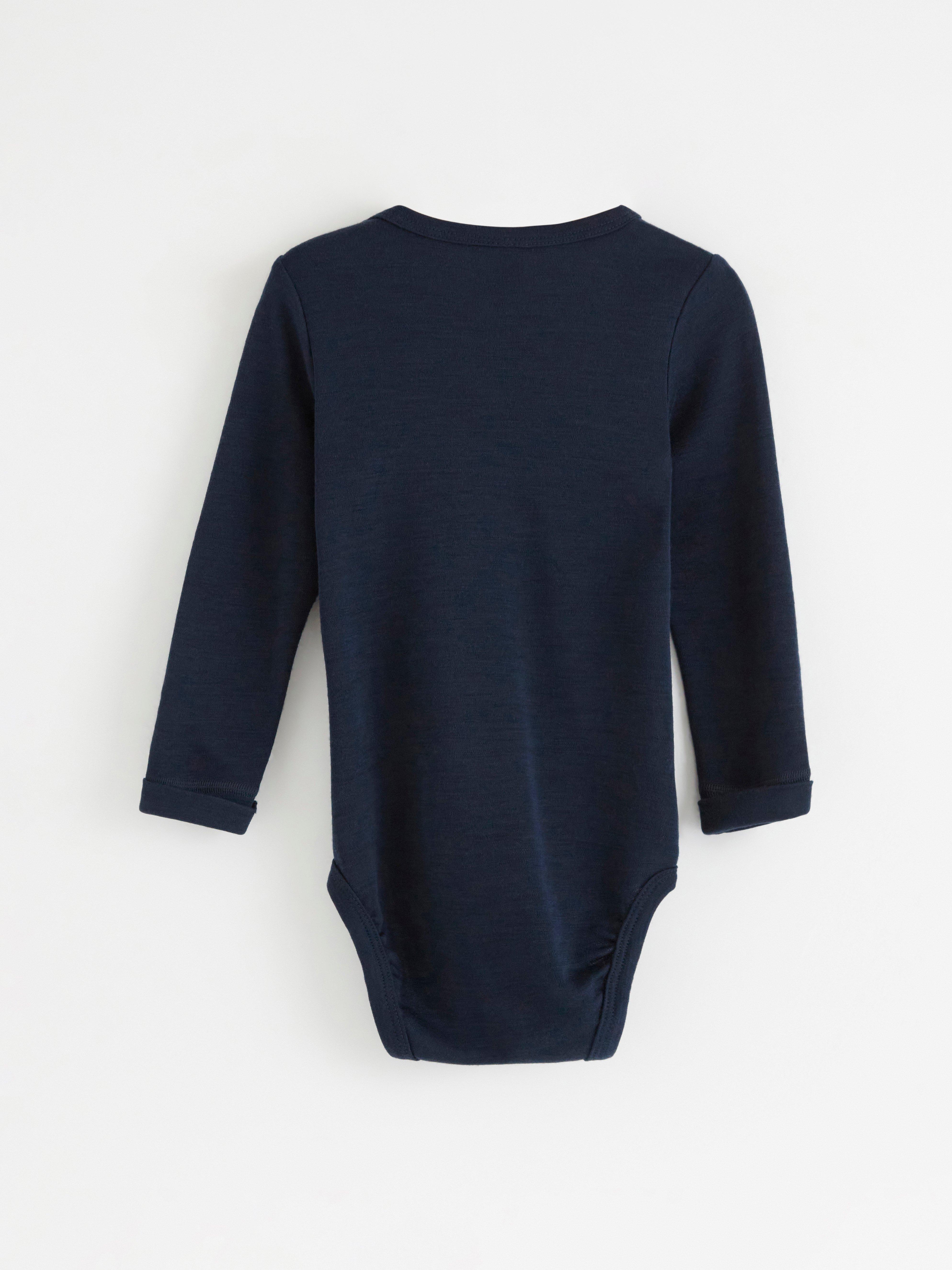 Långärmad body i merinoull Navy