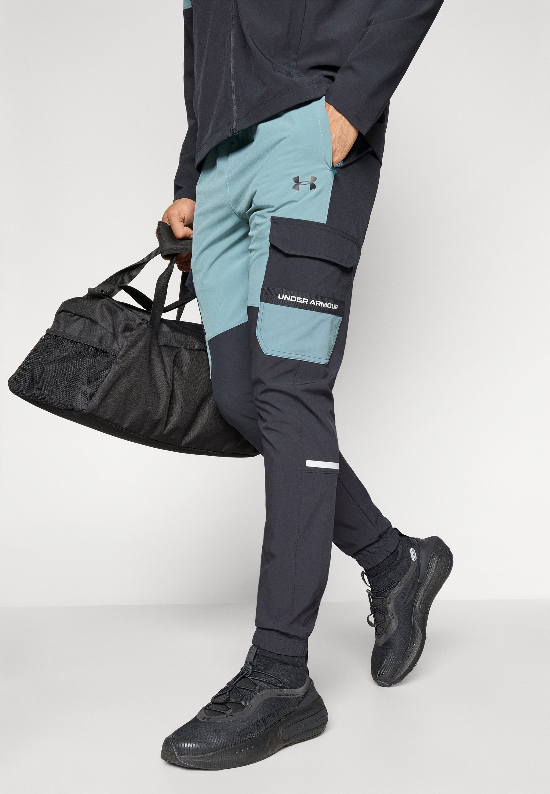 Pantaloni Under Armour UTILITY - Pantaloni da tuta - nero/blu diaspro