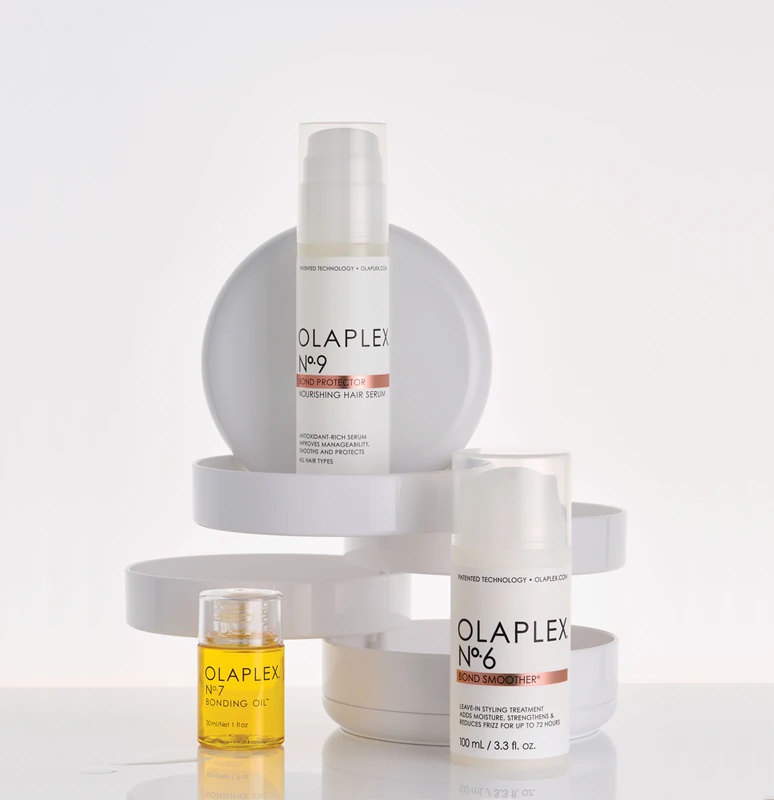 Olaplex N°6 Bond Smoother vlažilna krema za oblikovanje las proti skodranim lasem