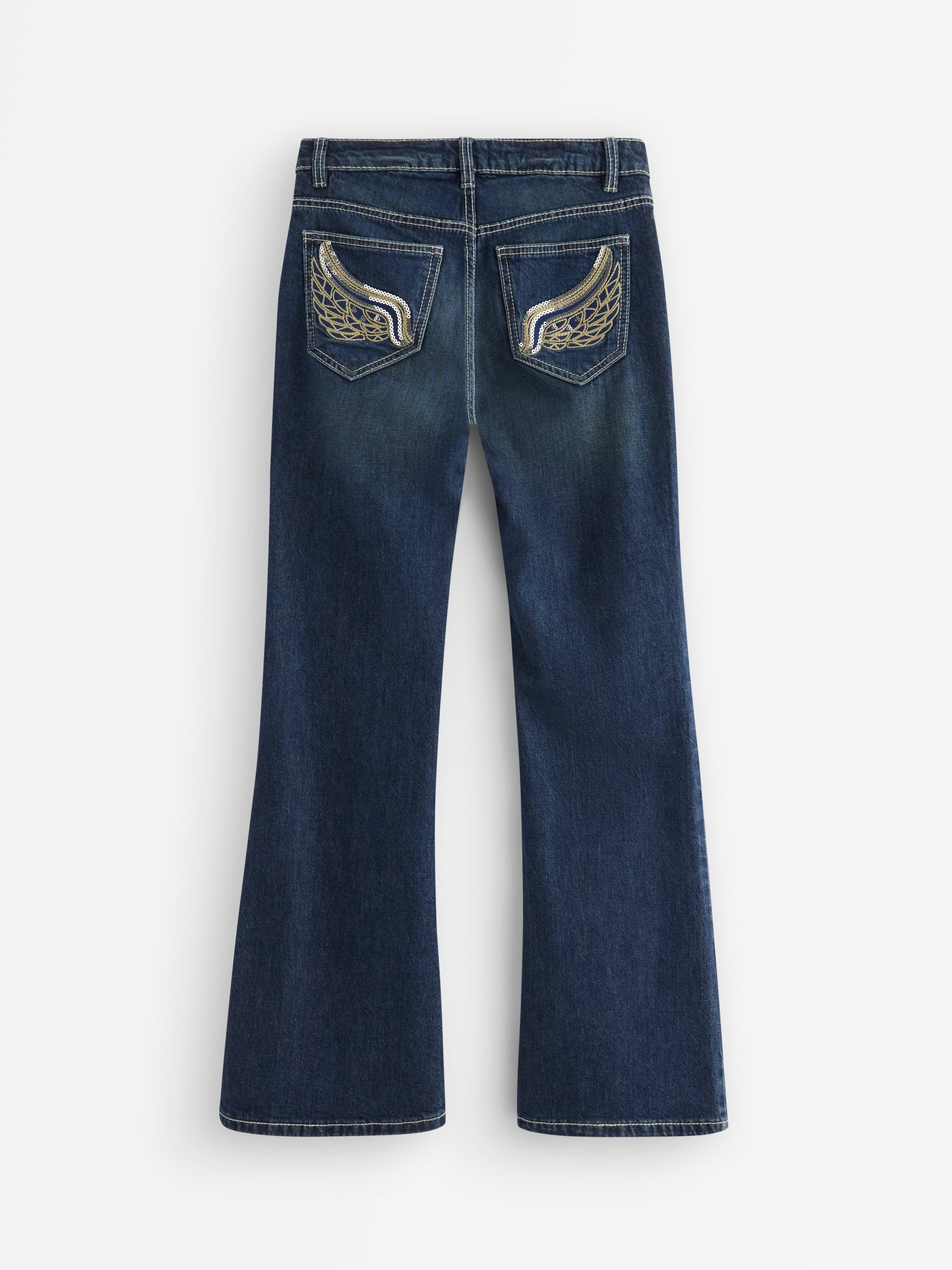 Vaqueros FREJA de pierna ancha con bolsillos traseros decorados. Denim oscuro.