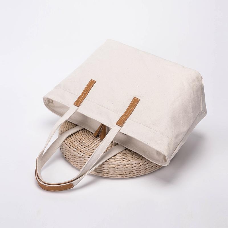 Version coréenne d'un sac cabas japonais en toile à l'ambiance épurée, grande capacité, sac bandoulière pour femme