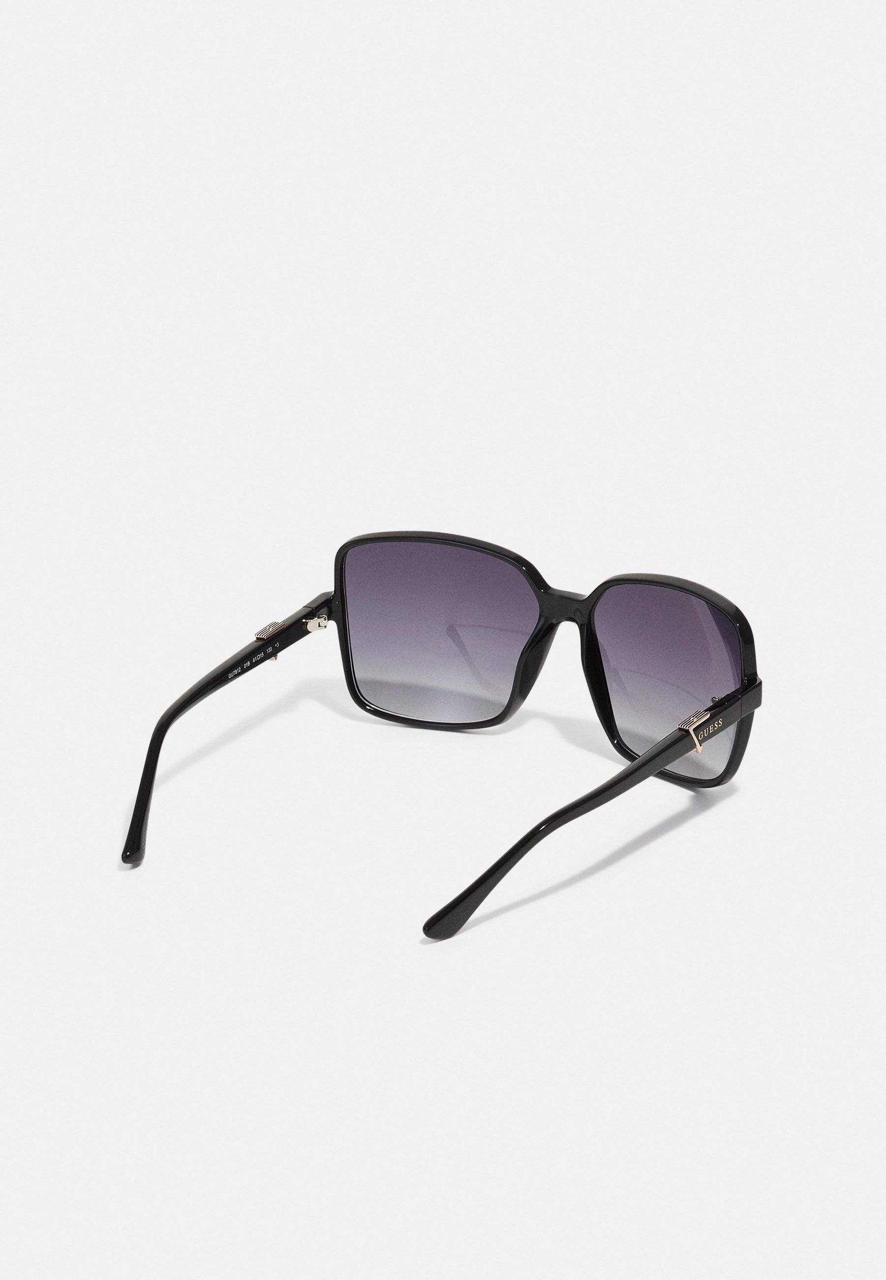 Lunettes de soleil Guess - noires