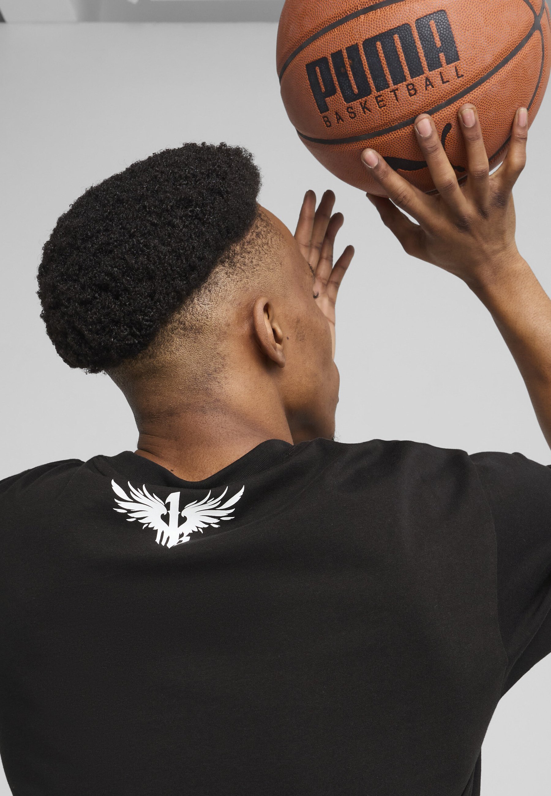 Puma MELO ALIEN SKINS BASKETBALL - T-shirt stampata - nera