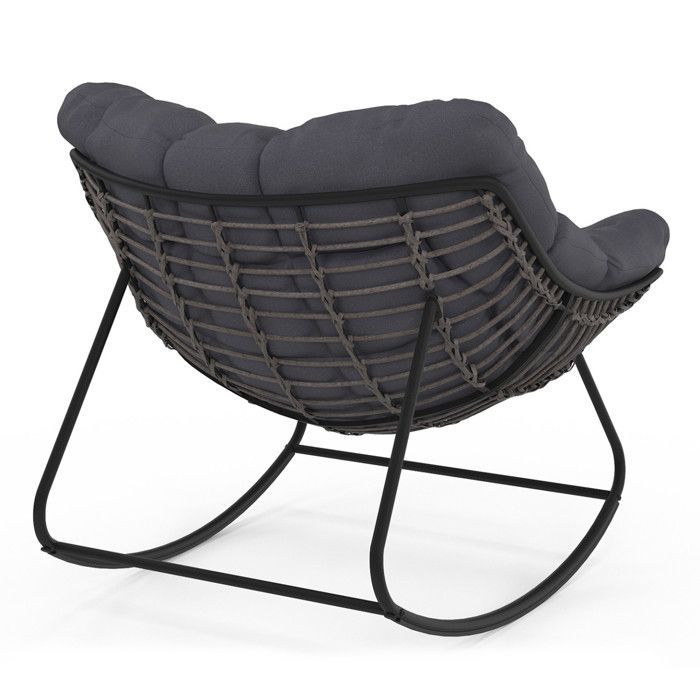 Silla mecedora de jardín IDMARKET LOA con efecto ratán gris y cojín gris.