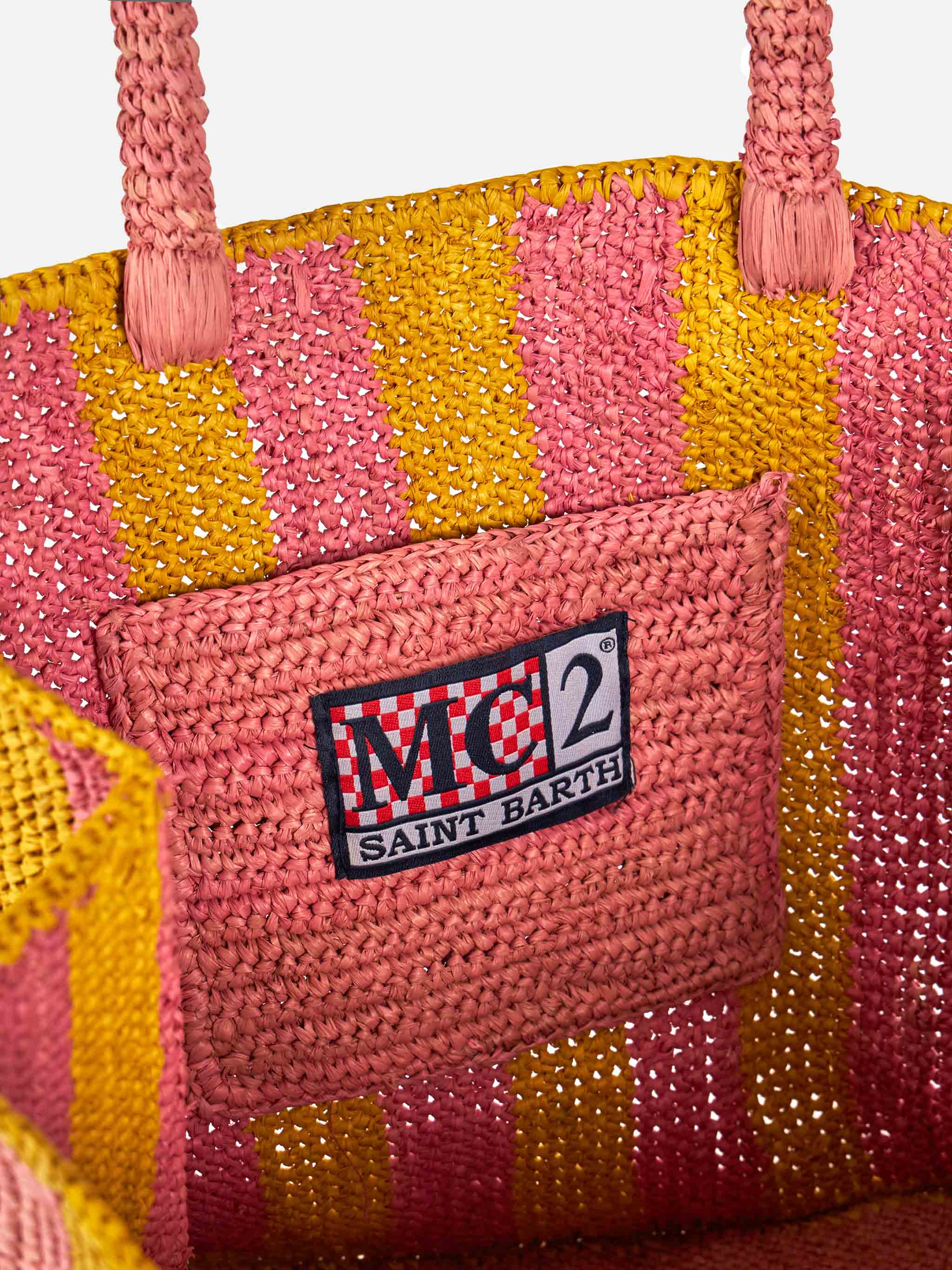 Bolso Colette de rafia a rayas.