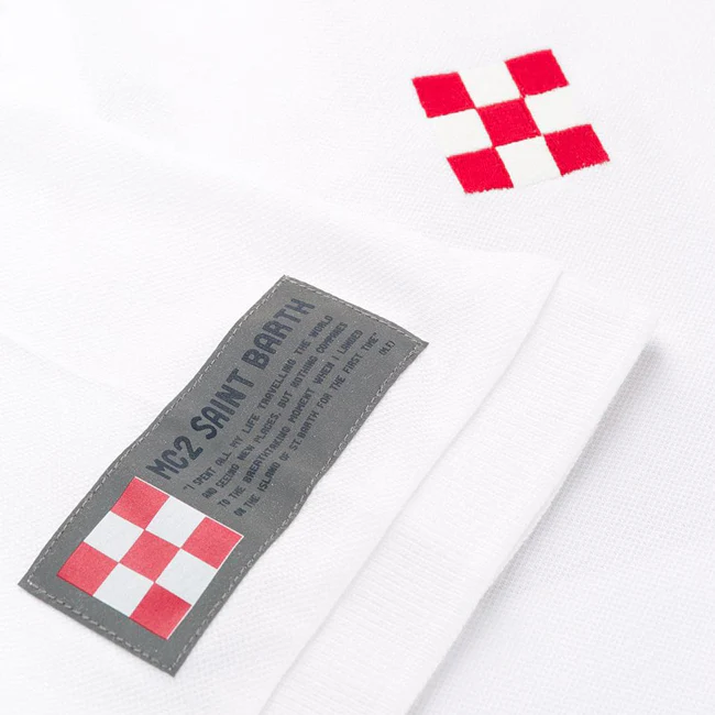 Polo piqué pour enfant avec broderie sur le devant et imprimé au dos