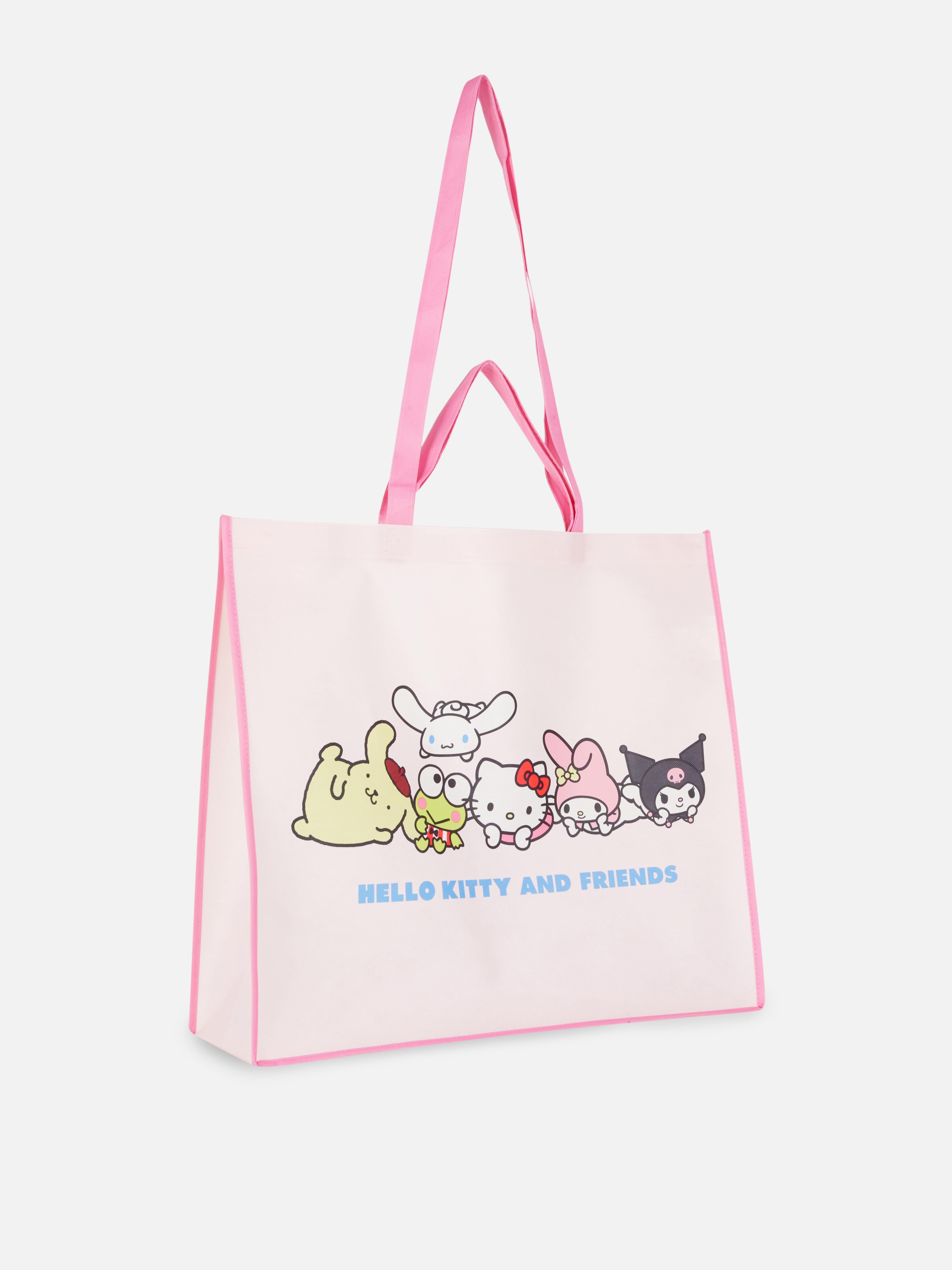 Geantă XL Hello Kitty and Friends O geantă Hello Kitty cu curea de umăr și imprimeu