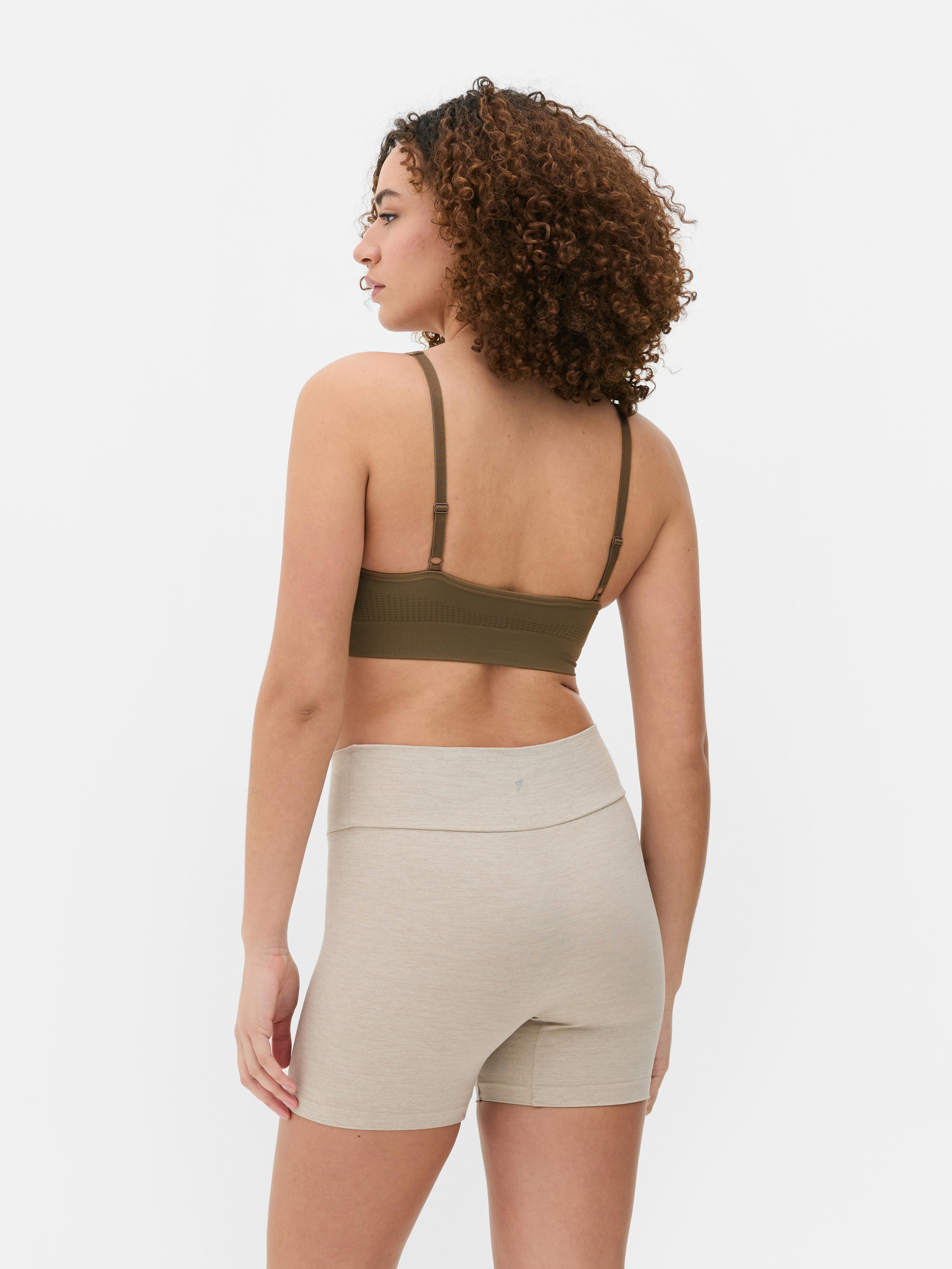 Seamless sports bras, set of 2. Two unpadded sports bras with adjustable straps.