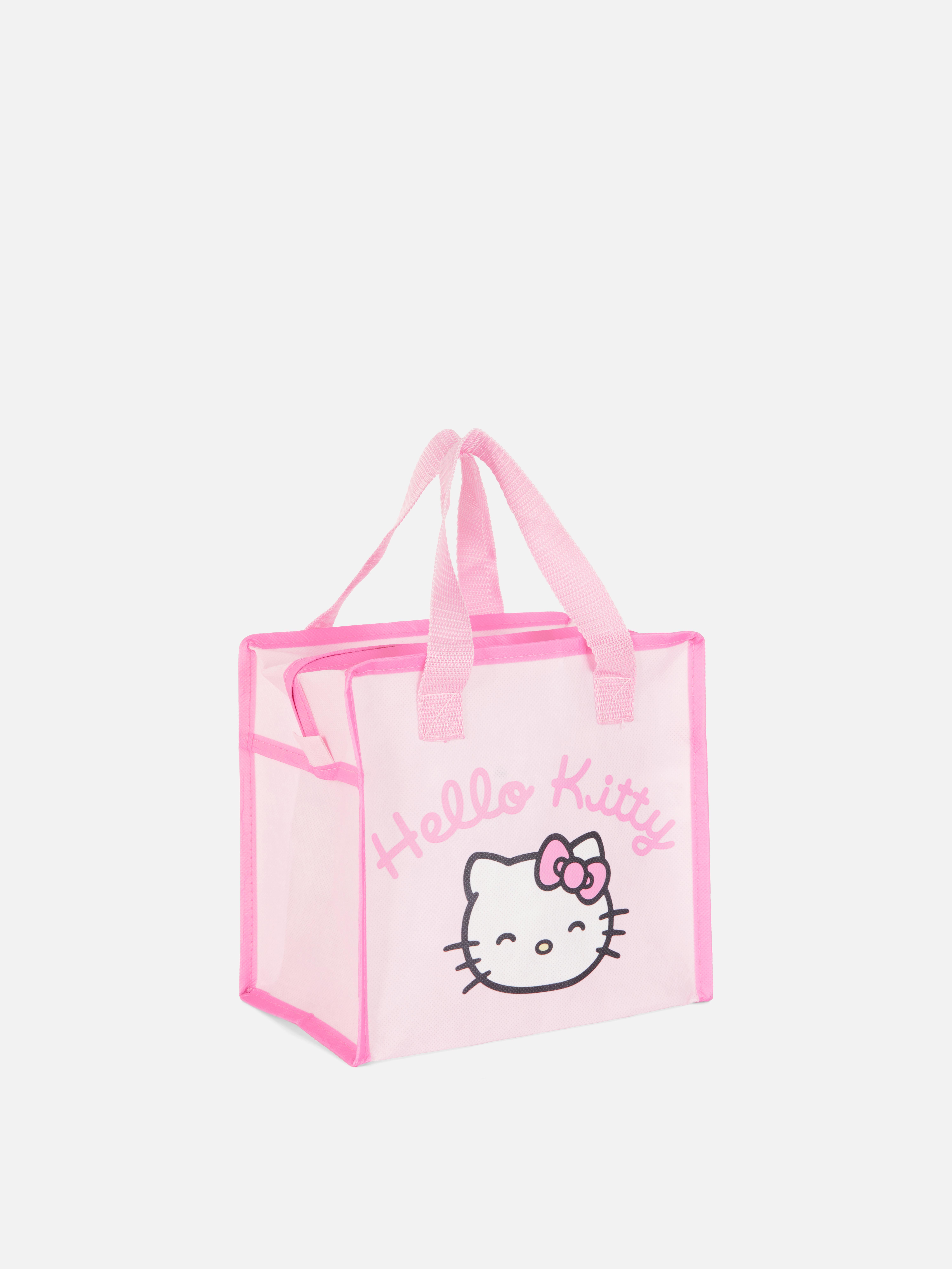 Geantă de prânz Hello Kitty O geantă de prânz cu fermoar, mânere și un design drăguț cu Hello Kitty