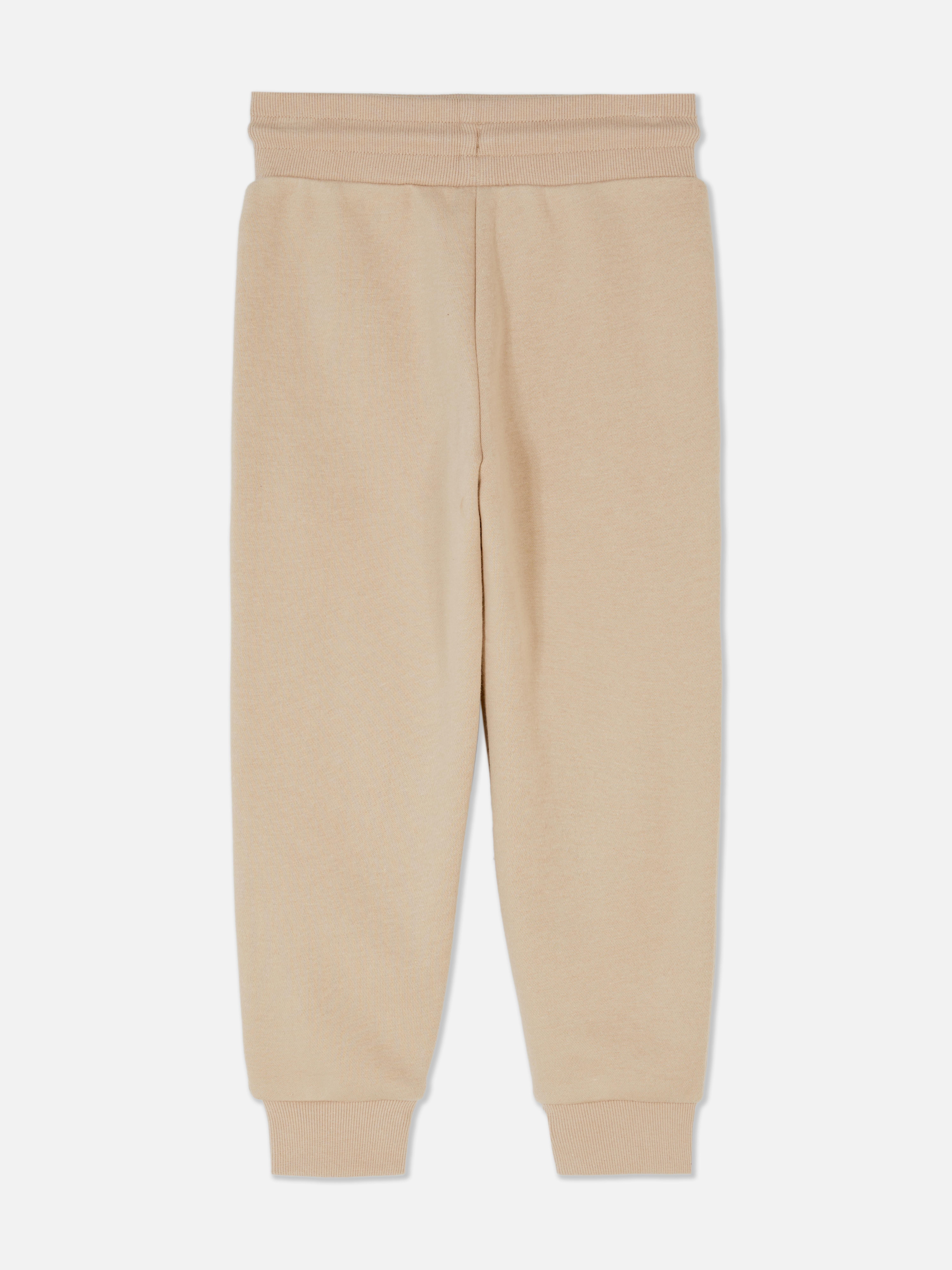 Pantaloni de trening cu imprimeu Pokémon. Pantaloni de trening cu șnur de strângere, buzunare laterale, manșete la gleznă și imprimeu cu personaje Pokémon.