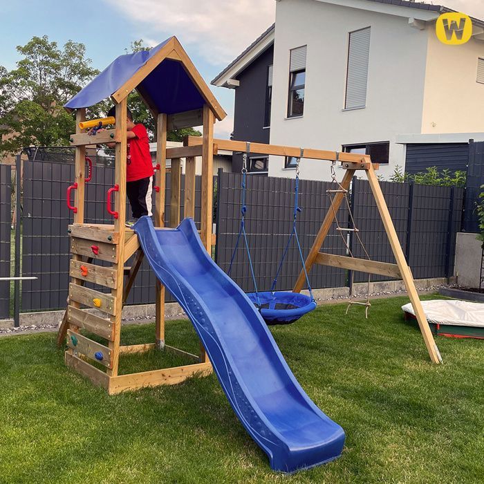 Torre de juegos de madera WICKEY FreeFlyer con tobogán de 220 cm en color antracita, rocódromo y arenero – 10 años de garantía*.