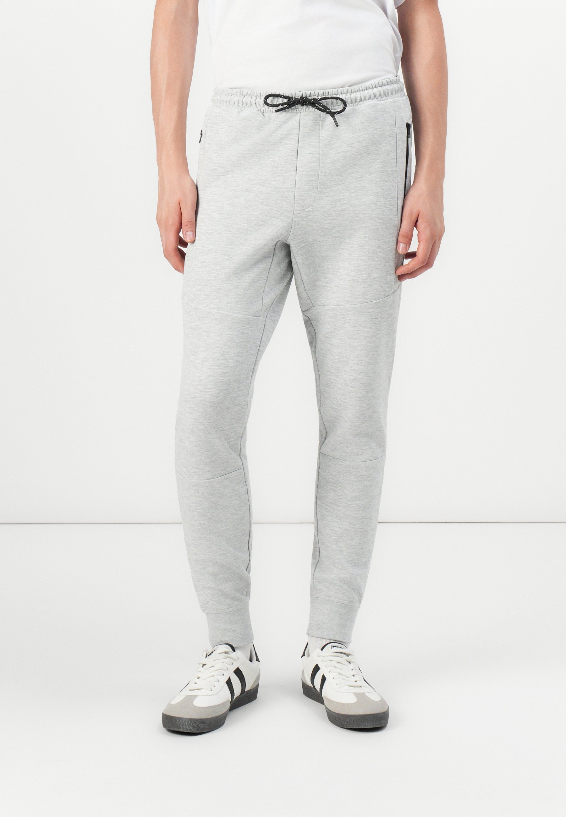 Pantaloni da tuta Jack & Jones JPSTWILL AIR - grigio chiaro