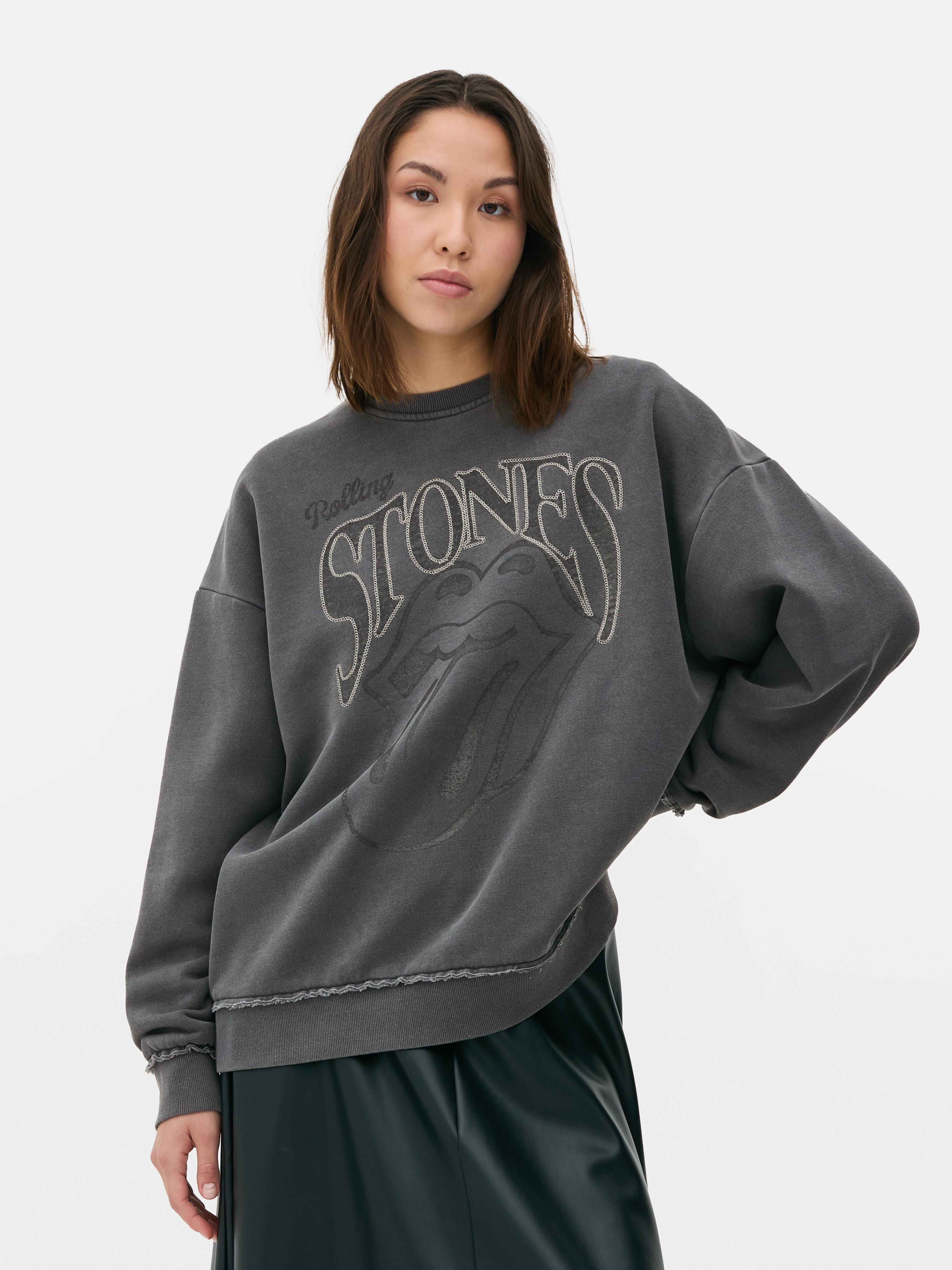 Hanorac cu imprimeu The Rolling Stones. Un hanorac cu aspect uzat, cu umeri căzuți, manșete cu nervuri și imprimeu cu o trupă pe partea din față.