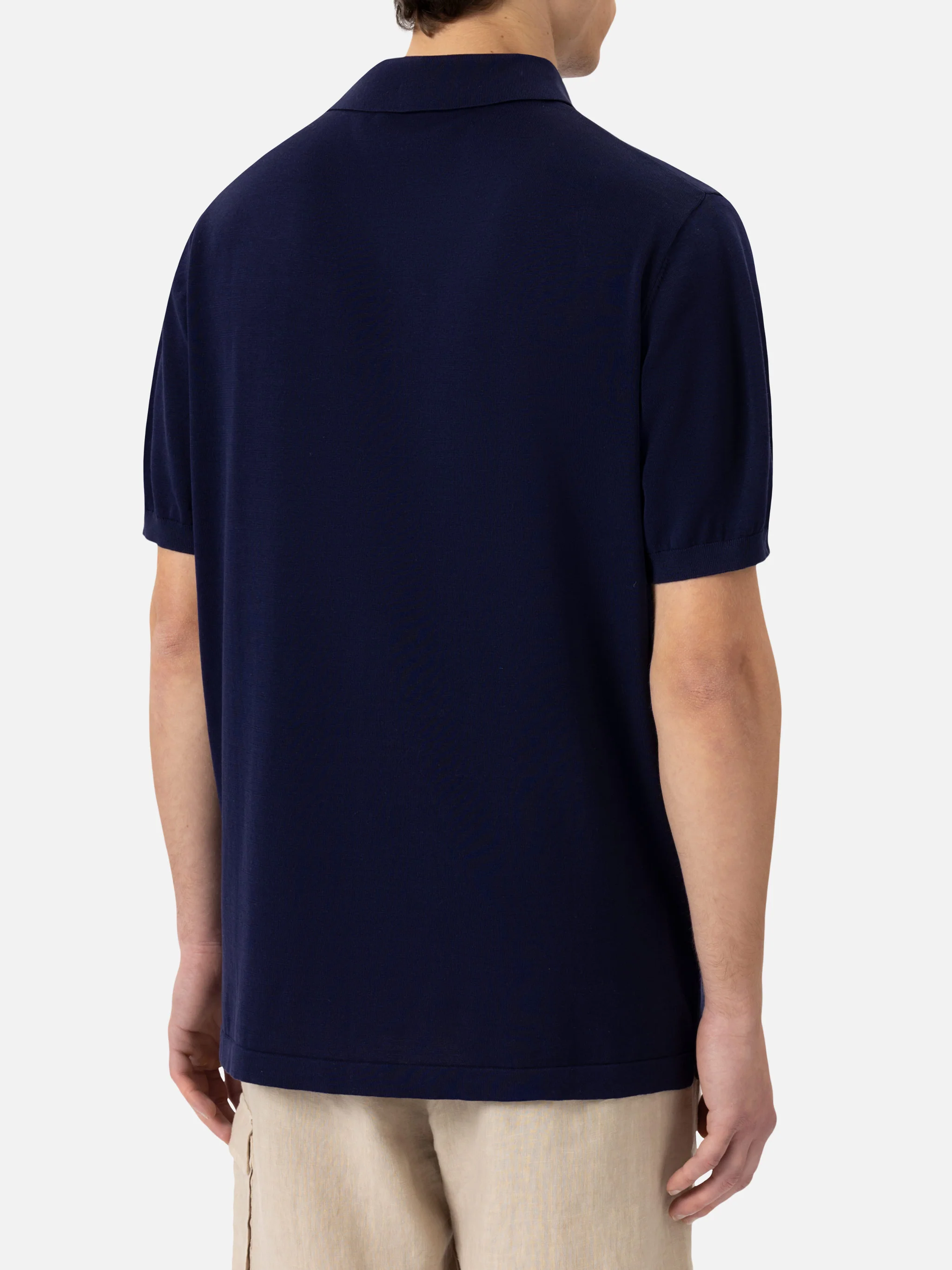 Sloan poloshirt in marineblauw, gebreid van zijde en katoen.