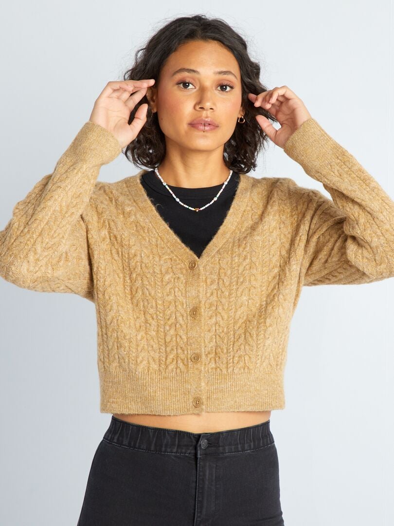 Gebreid vest met gedraaide details - BEIGE