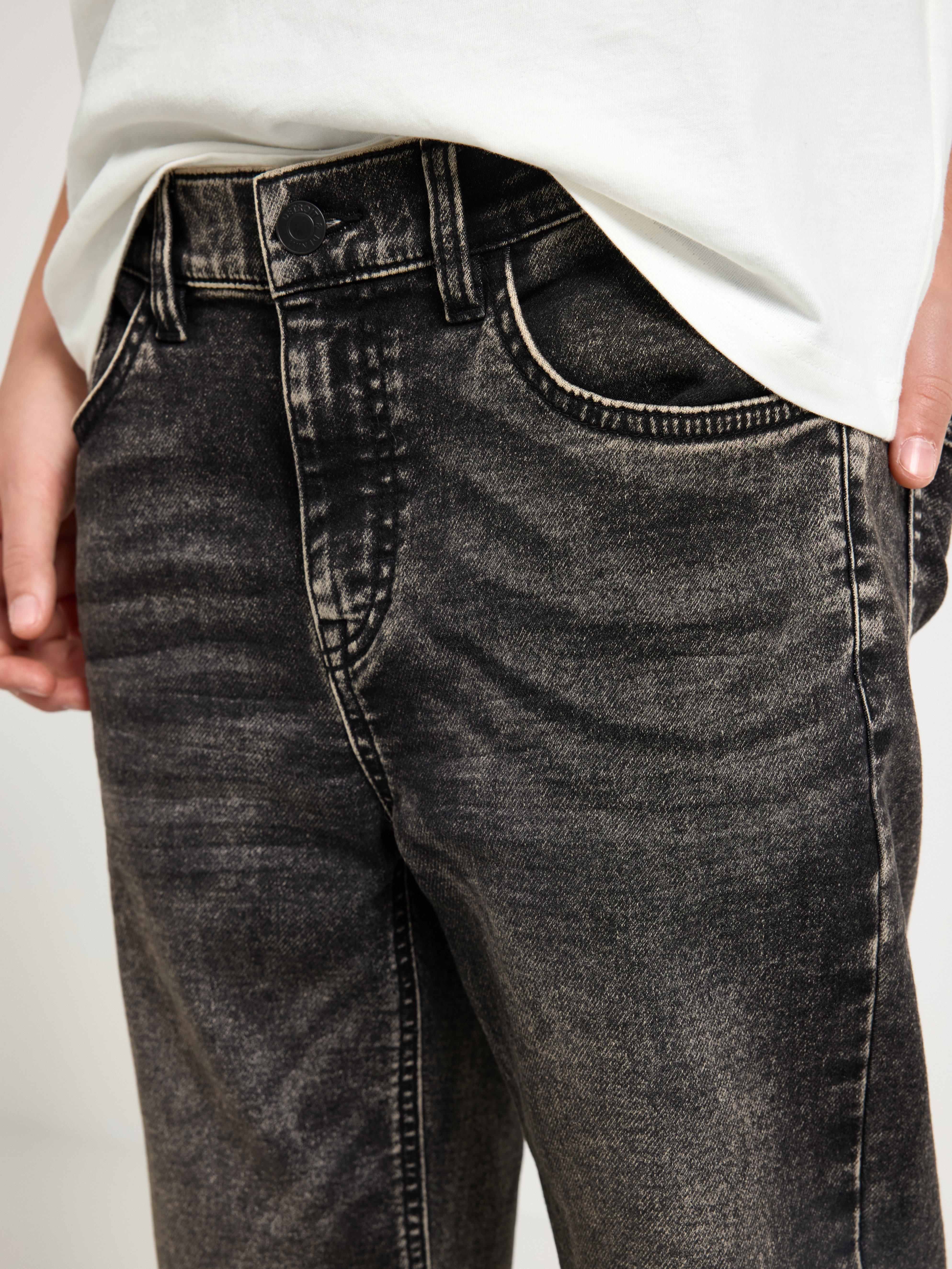 Pantalones vaqueros STAFFAN de punto súper elástico con pierna recta y cintura normal, color negro.