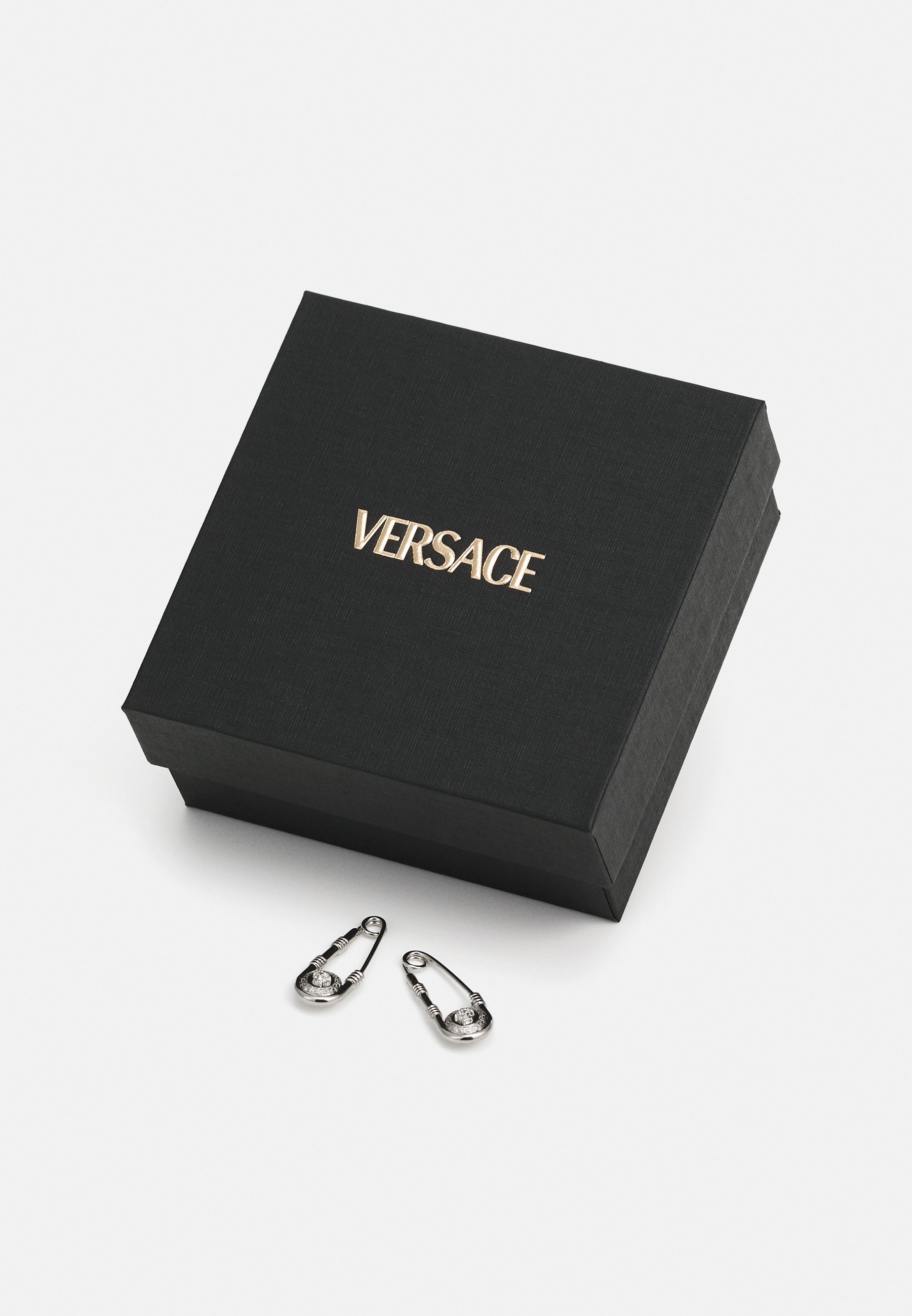 Boucles d'oreilles Versace unisexes - Boucles d'oreilles argentées