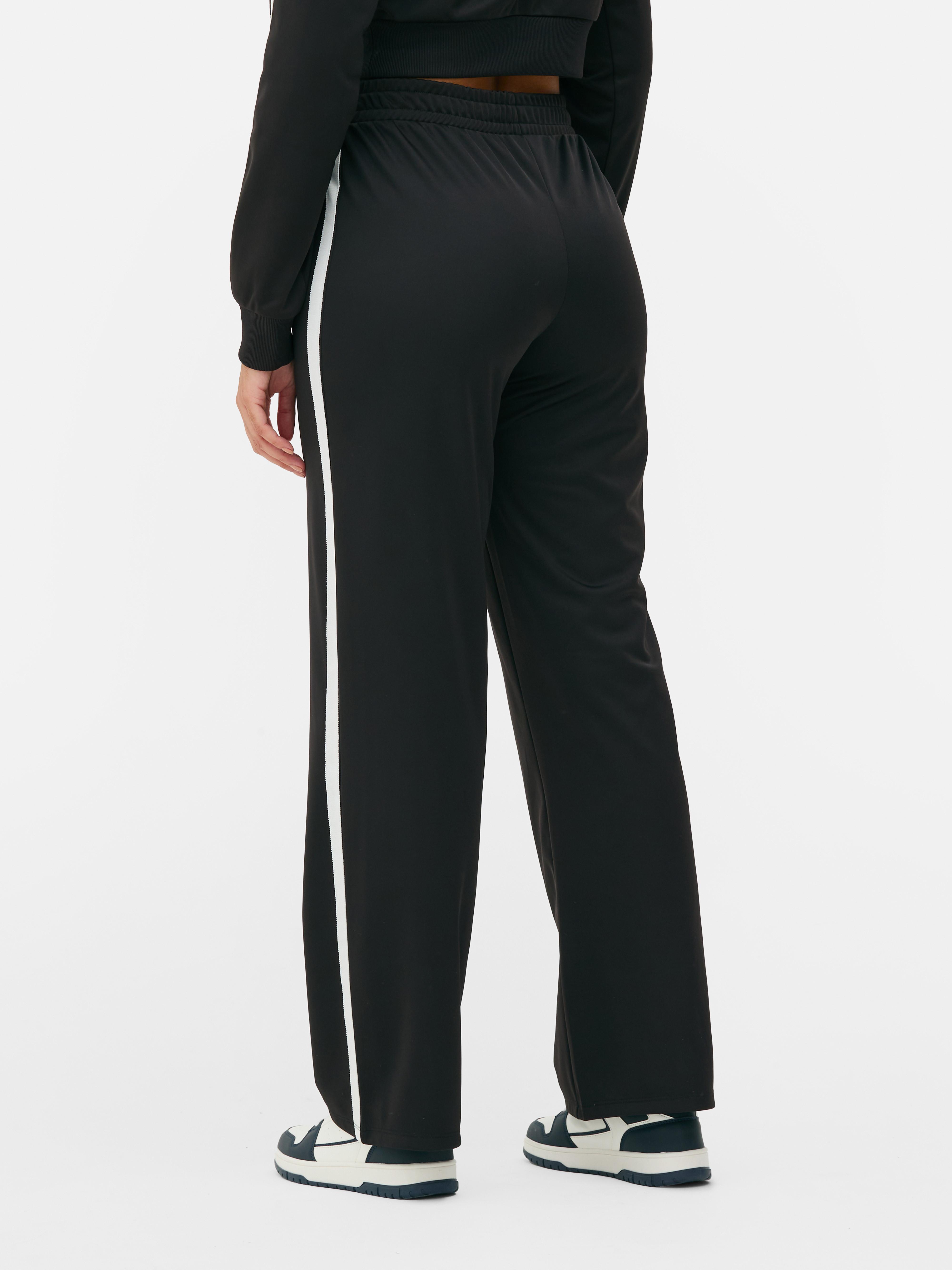 Pantaloni de trening asortați cu bandă laterală Pantaloni de trening drepți cu talie elastică lată și bandă laterală