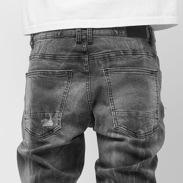 Jeans reißen und reparieren