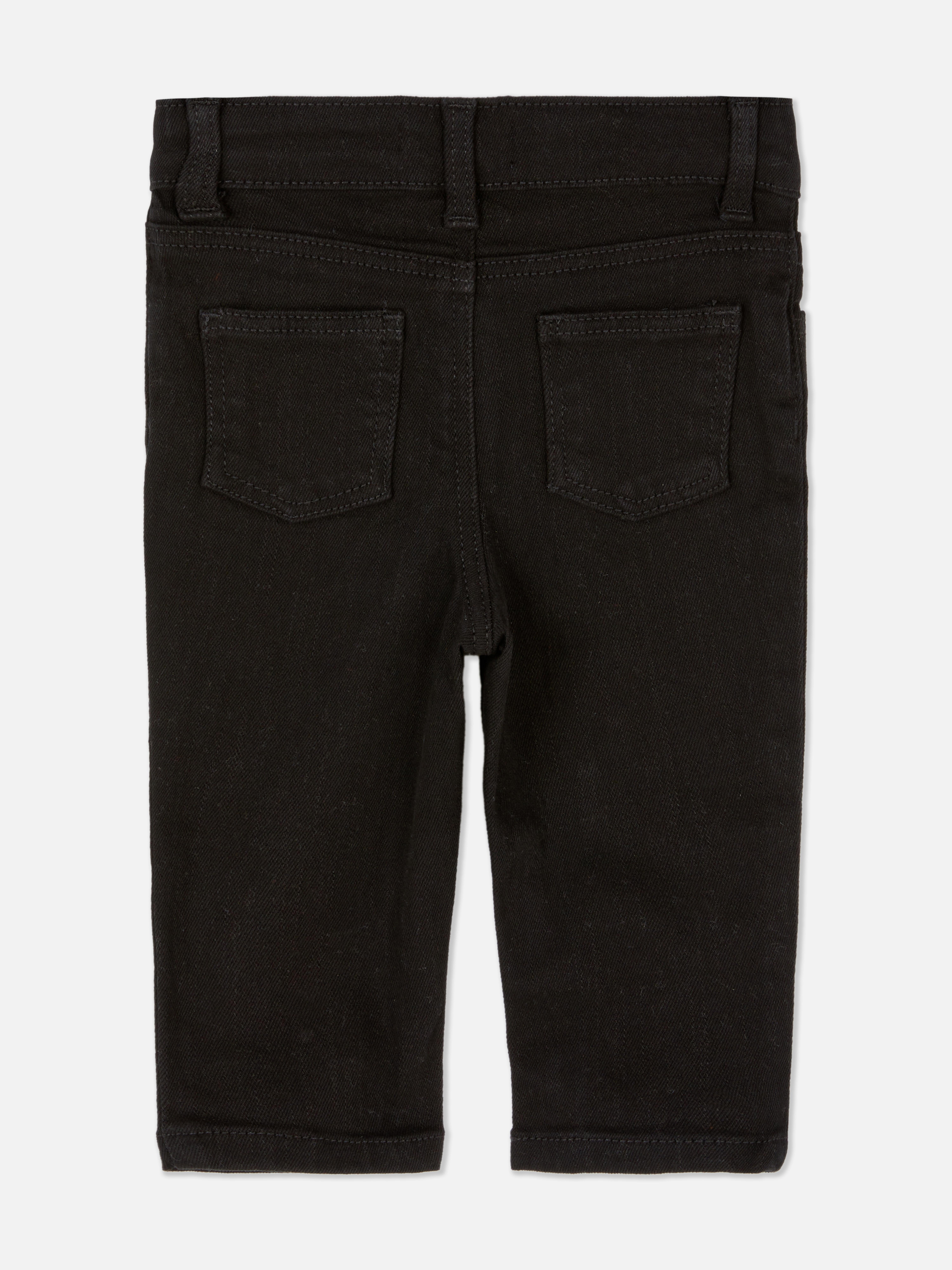 Pantaloni din denim elastic. Acești blugi au găici pentru curea, nasture în față și detalii de buzunar.