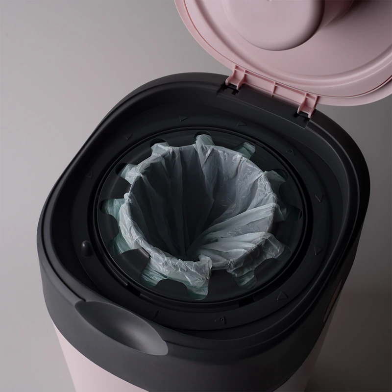 Tommee Tippee Twist & Click rožinė sauskelnių dėžutė + kasetė