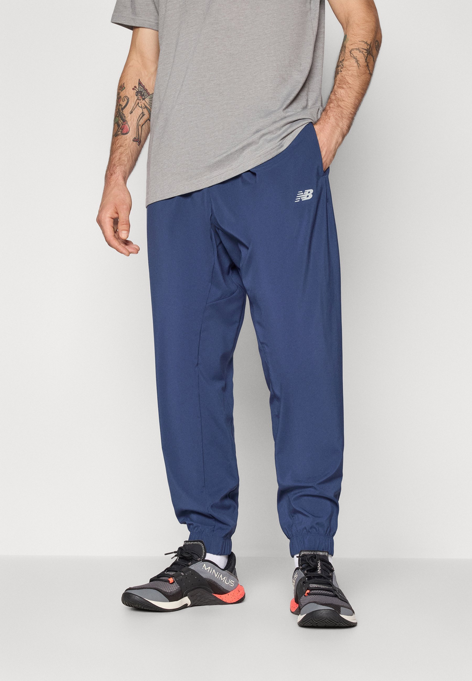 New Balance SPORT ESSENTIALS JOGGER - Trainingsbroek - marineblauw