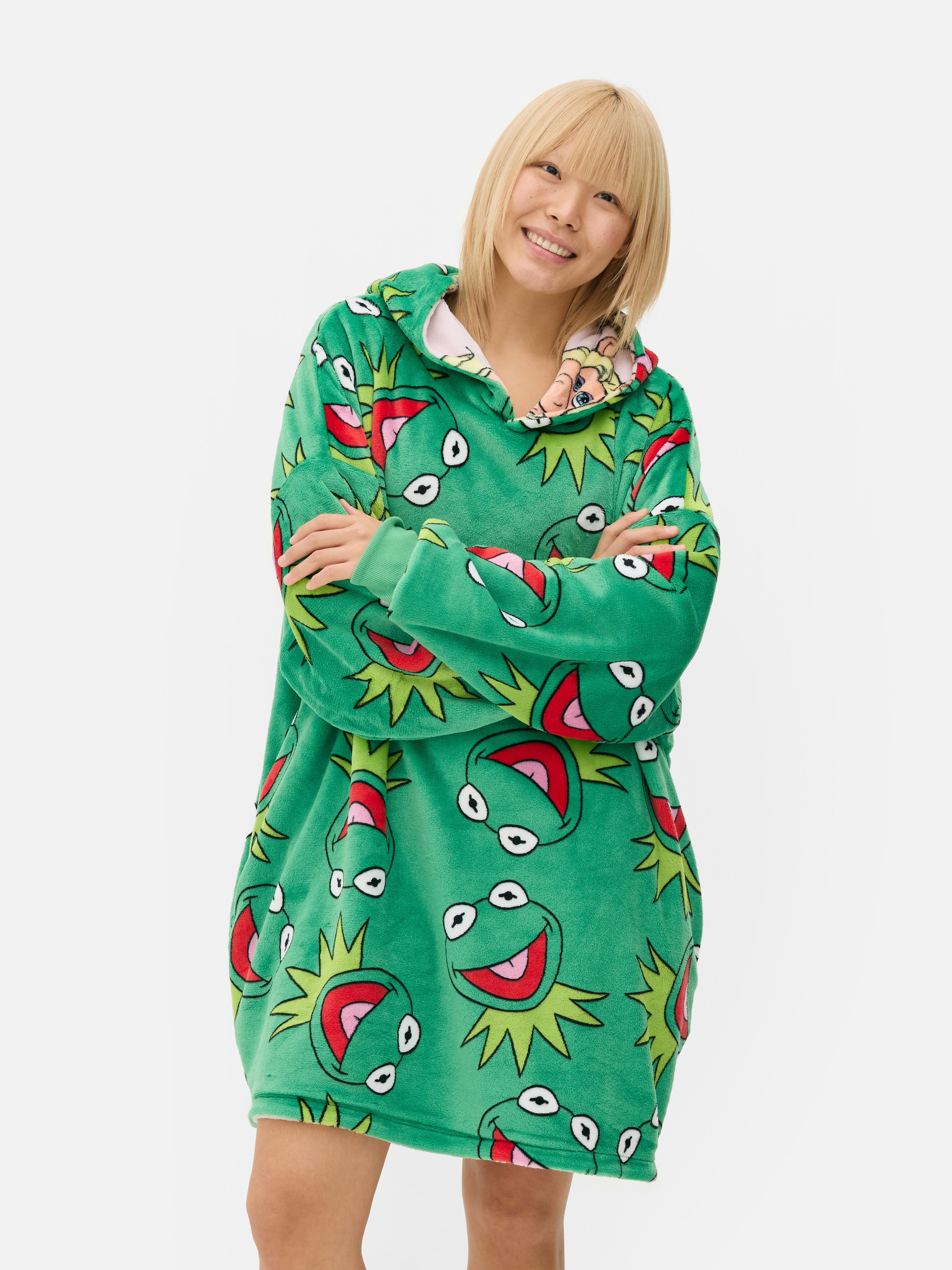 Snuddie reversibil cu Muppets. Un snuddie moale cu un model cu Muppets pe ambele părți.