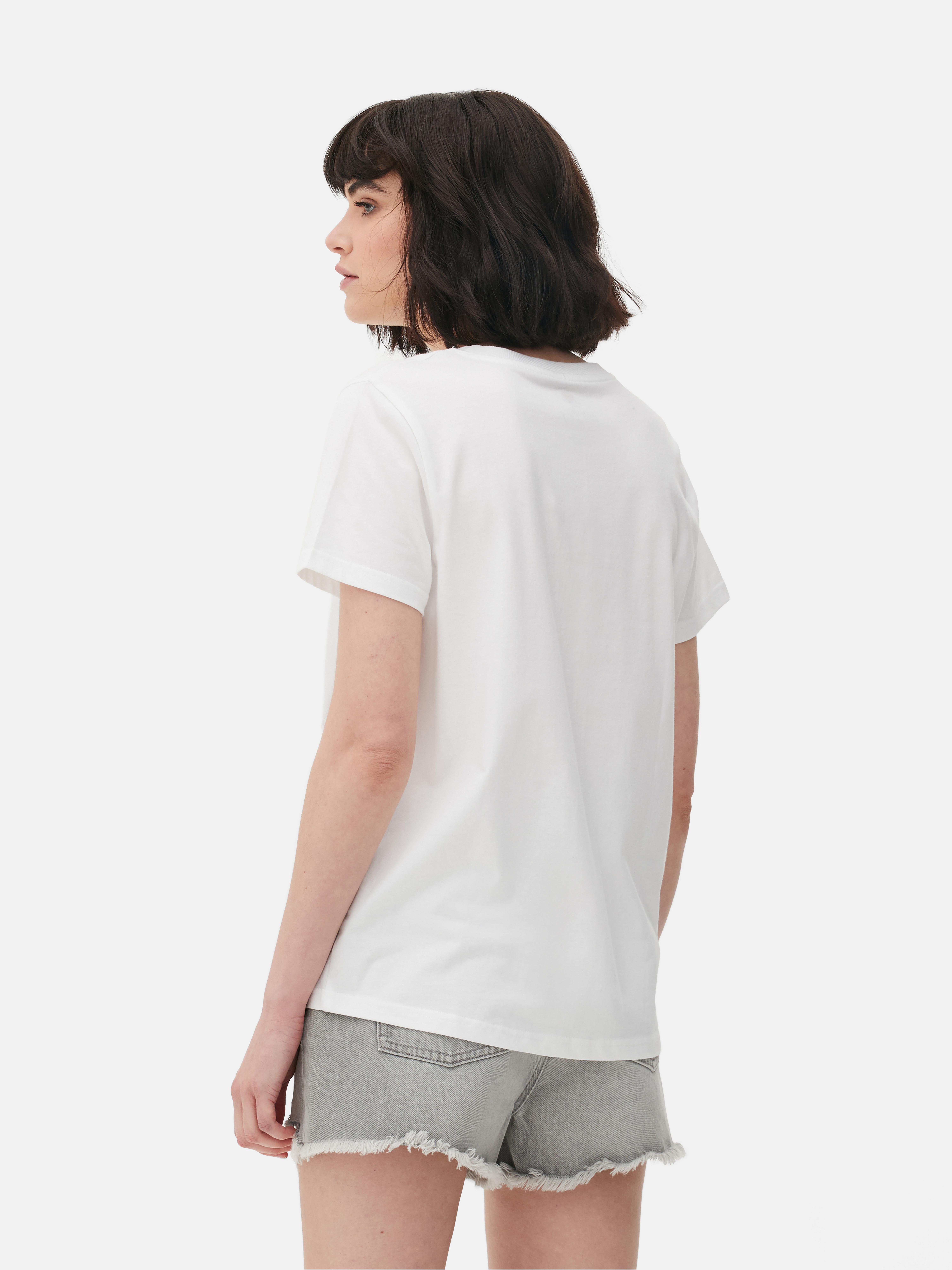 Tricou cu imprimeu Keith Haring Înveselește-ți colecția cu acest tricou cu mânecă scurtă, care prezintă culorile vibrante și figurile funky ale lui Keith Haring.
