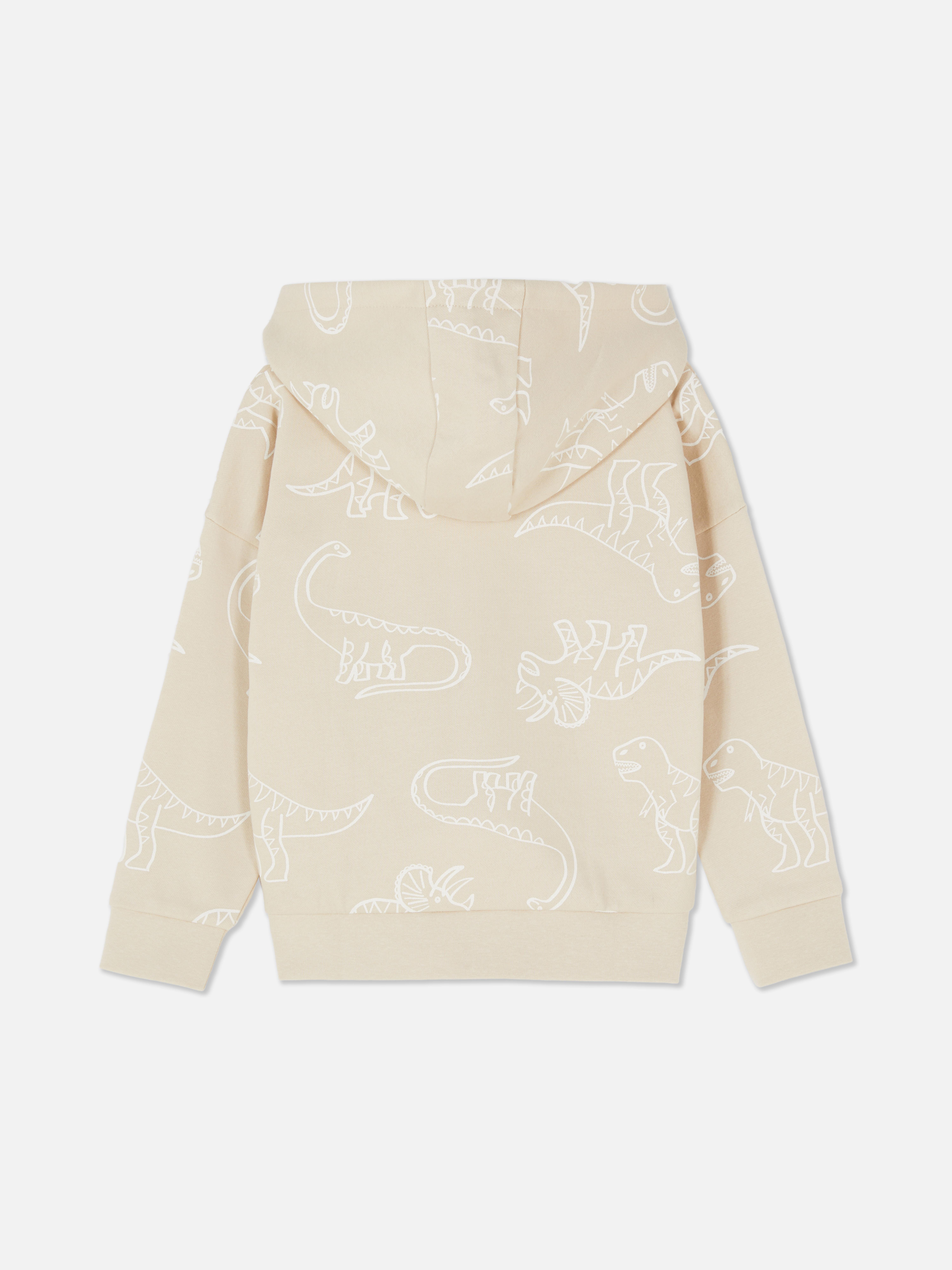 Cipzáros kapucnis pulóver Cipzáras kapucnis pulóver kenguruzsebekkel és teljes felületén nyomtatott mintával