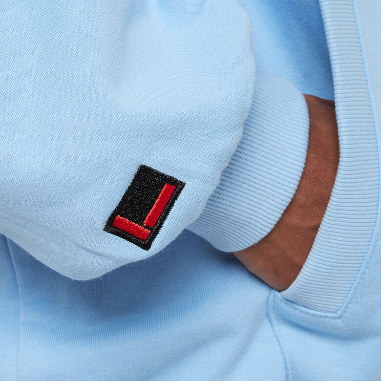 Sudadera con capucha estilo universitario