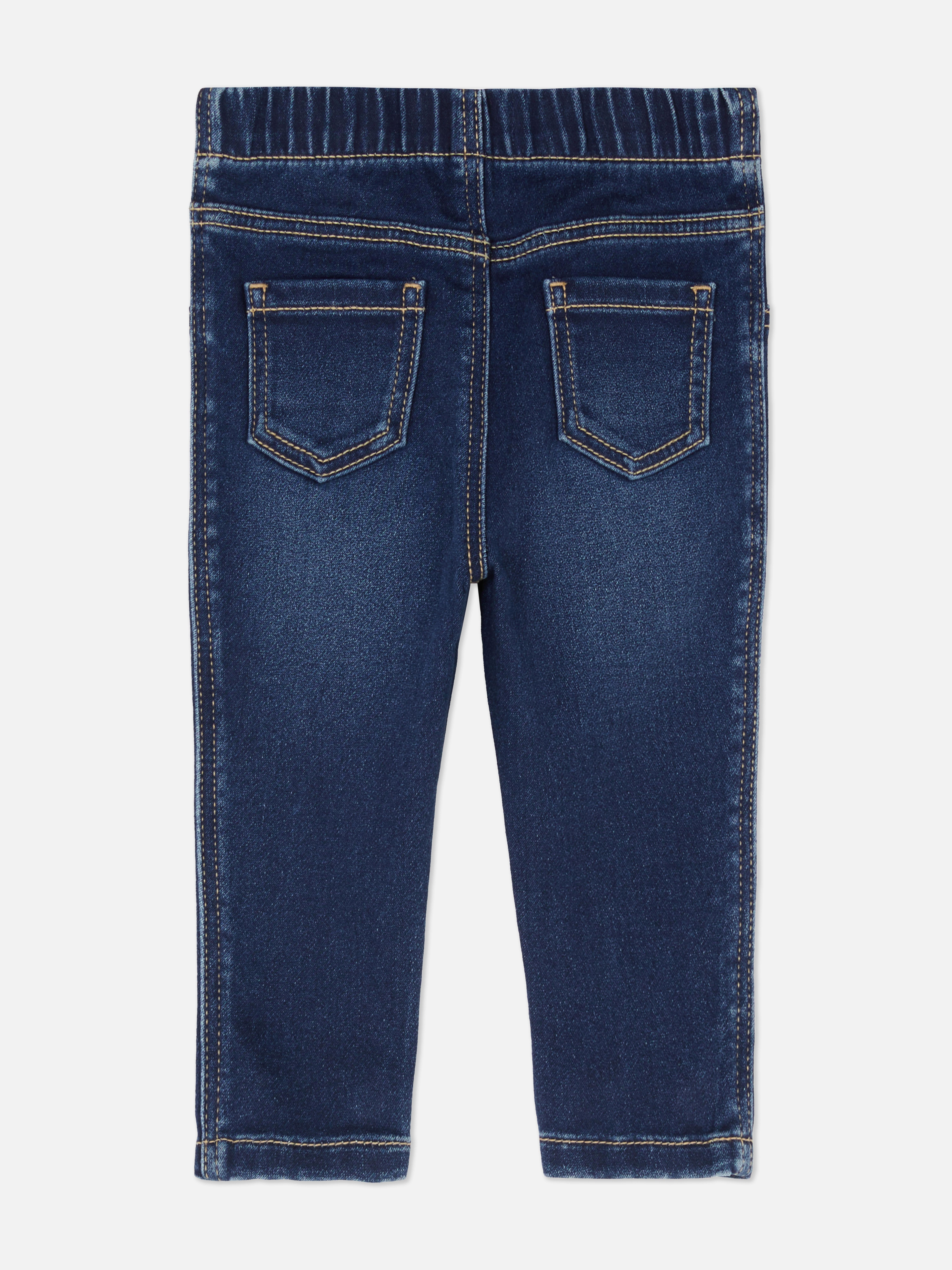Jeggings din denim, model pull-on. Colanți din denim cu talie elastică, detalii la buzunare și cusături contrastante.