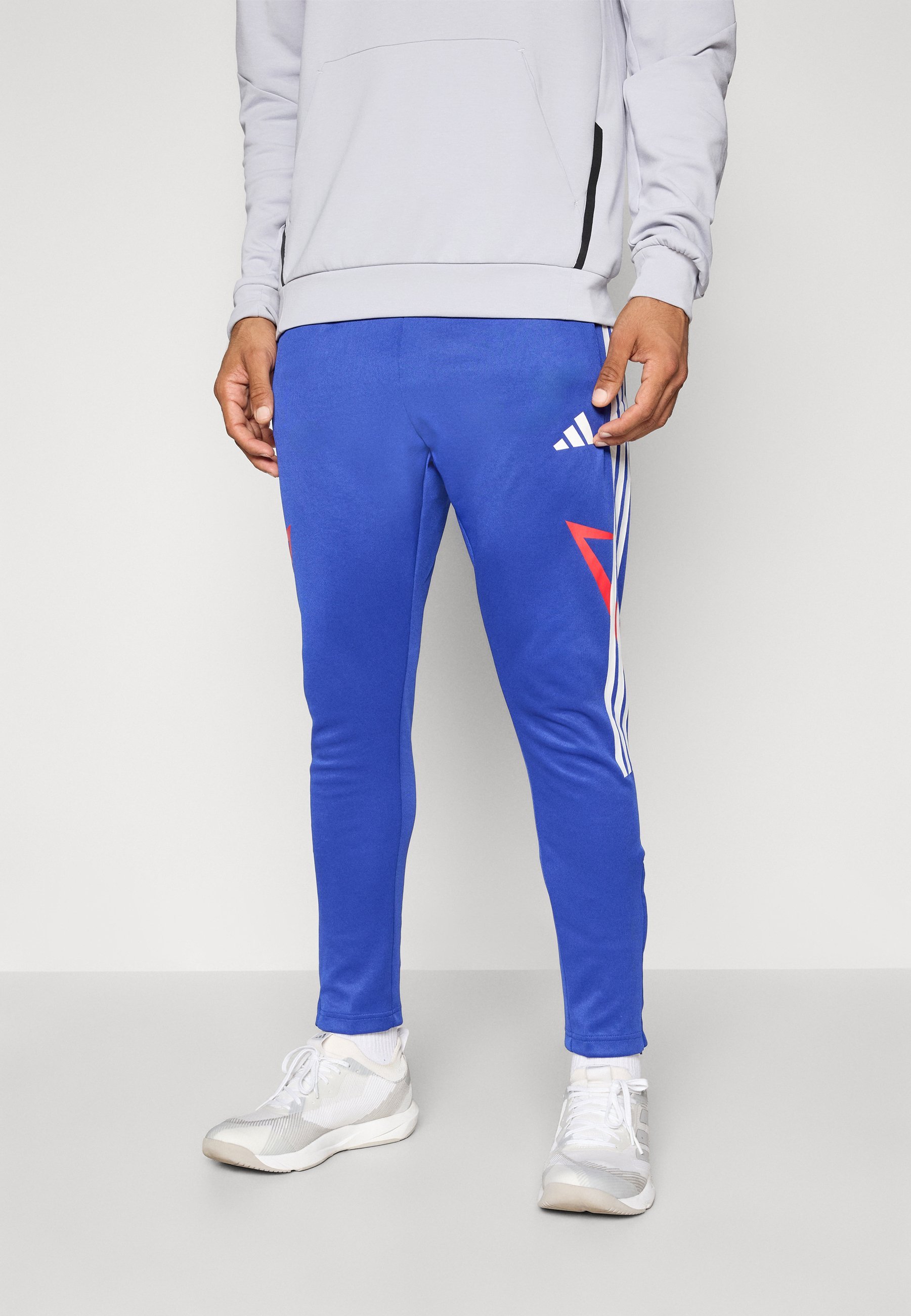 adidas Sportswear TIRO - Verryttelyhousut - semi-lucid blue/pure ruby/white