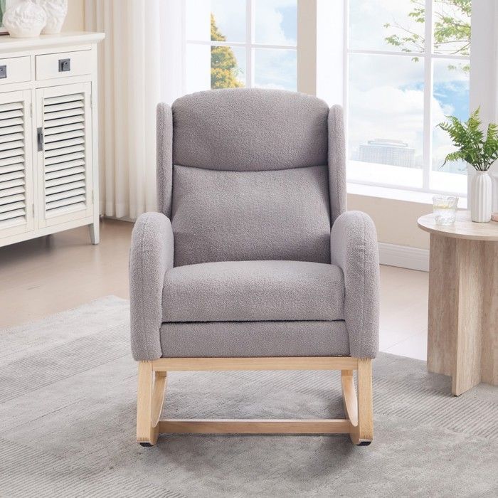 Fauteuil d'allaitement gris à bascule, dossier haut et repose-pieds réglable avec poche. Confortable pour salon et chambre.