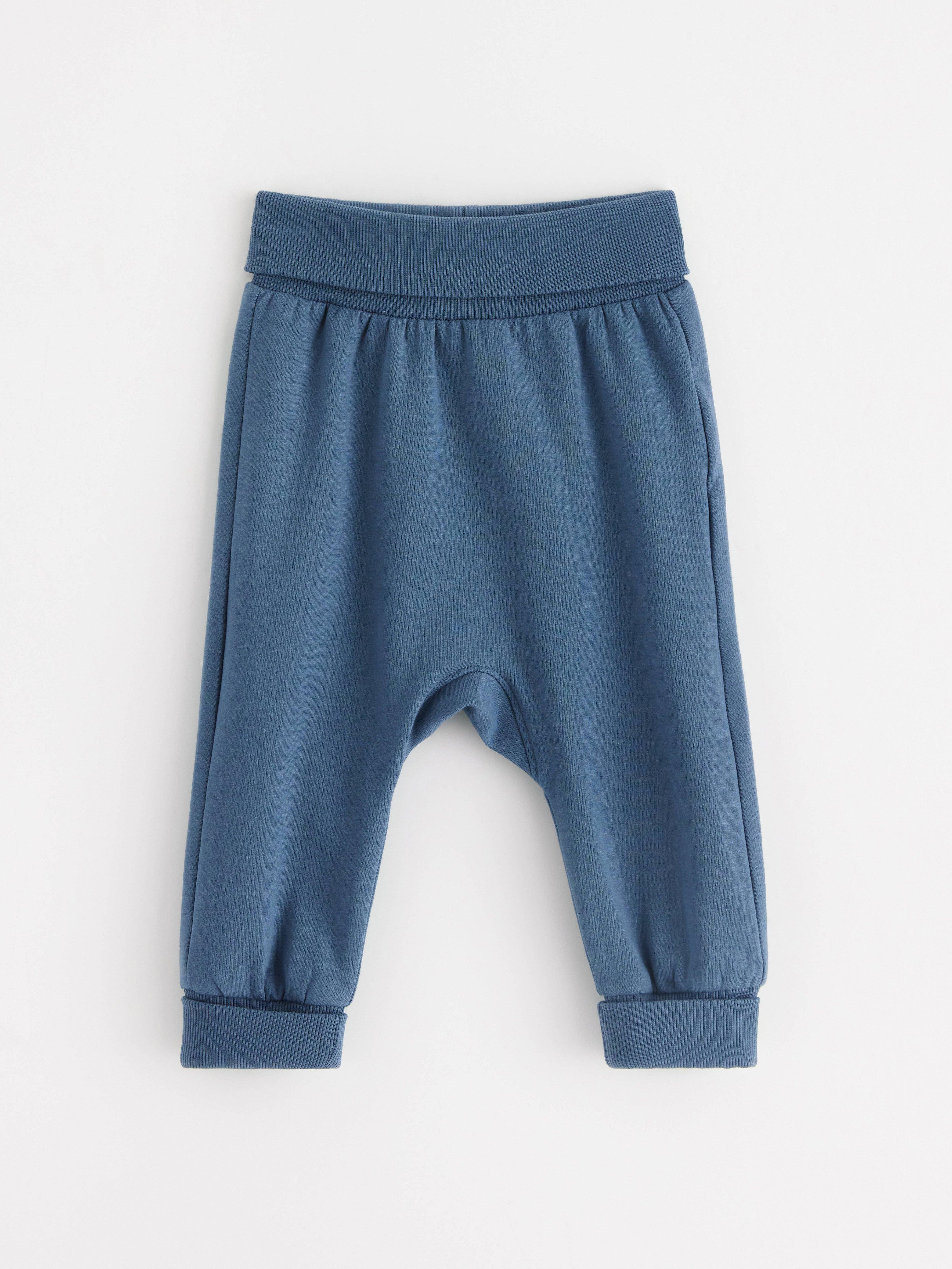 Pantalones deportivos azul oscuro empolvado