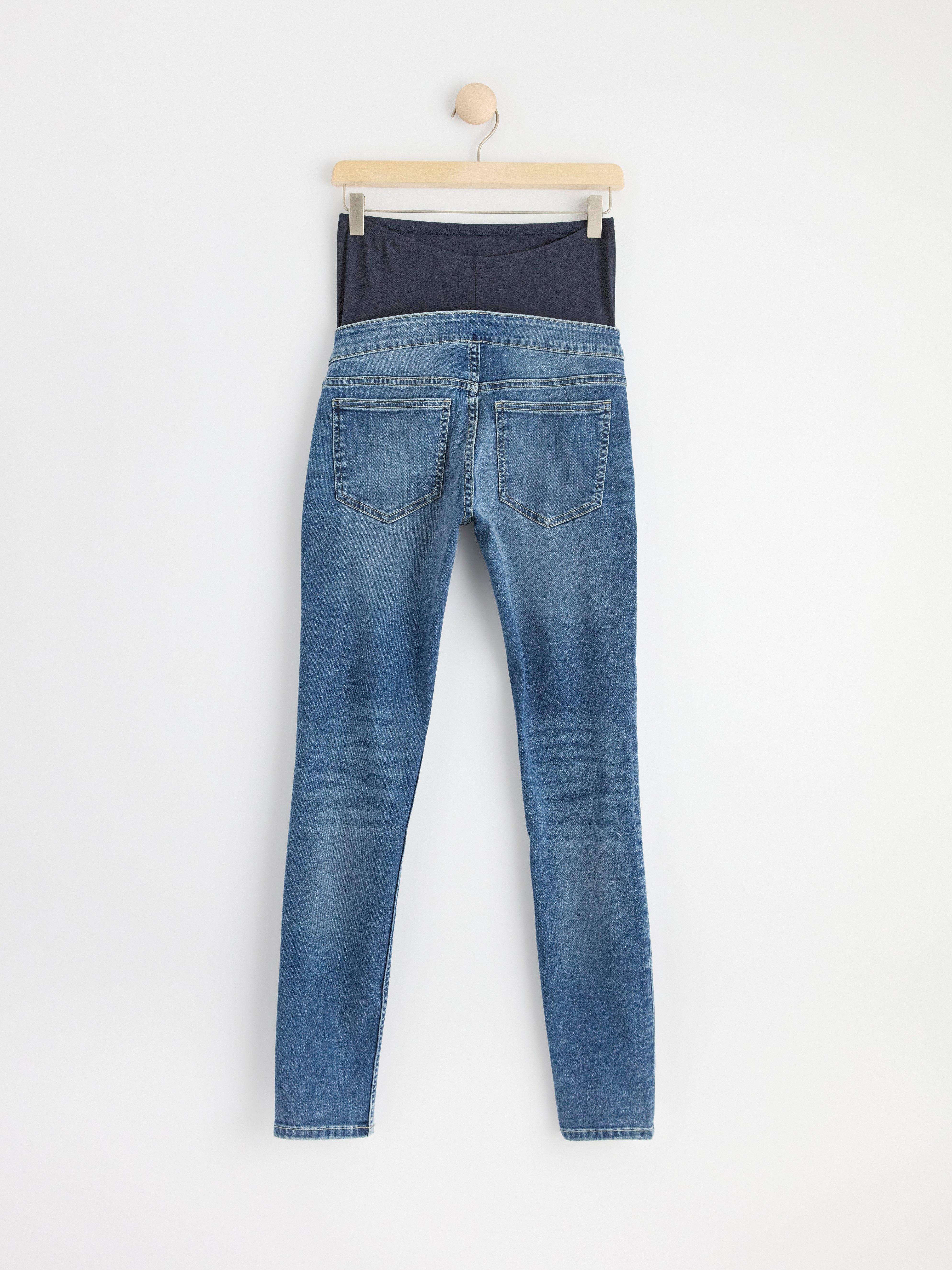 MOM SLIM Vaqueros premamá de tacto suave y denim ligero.