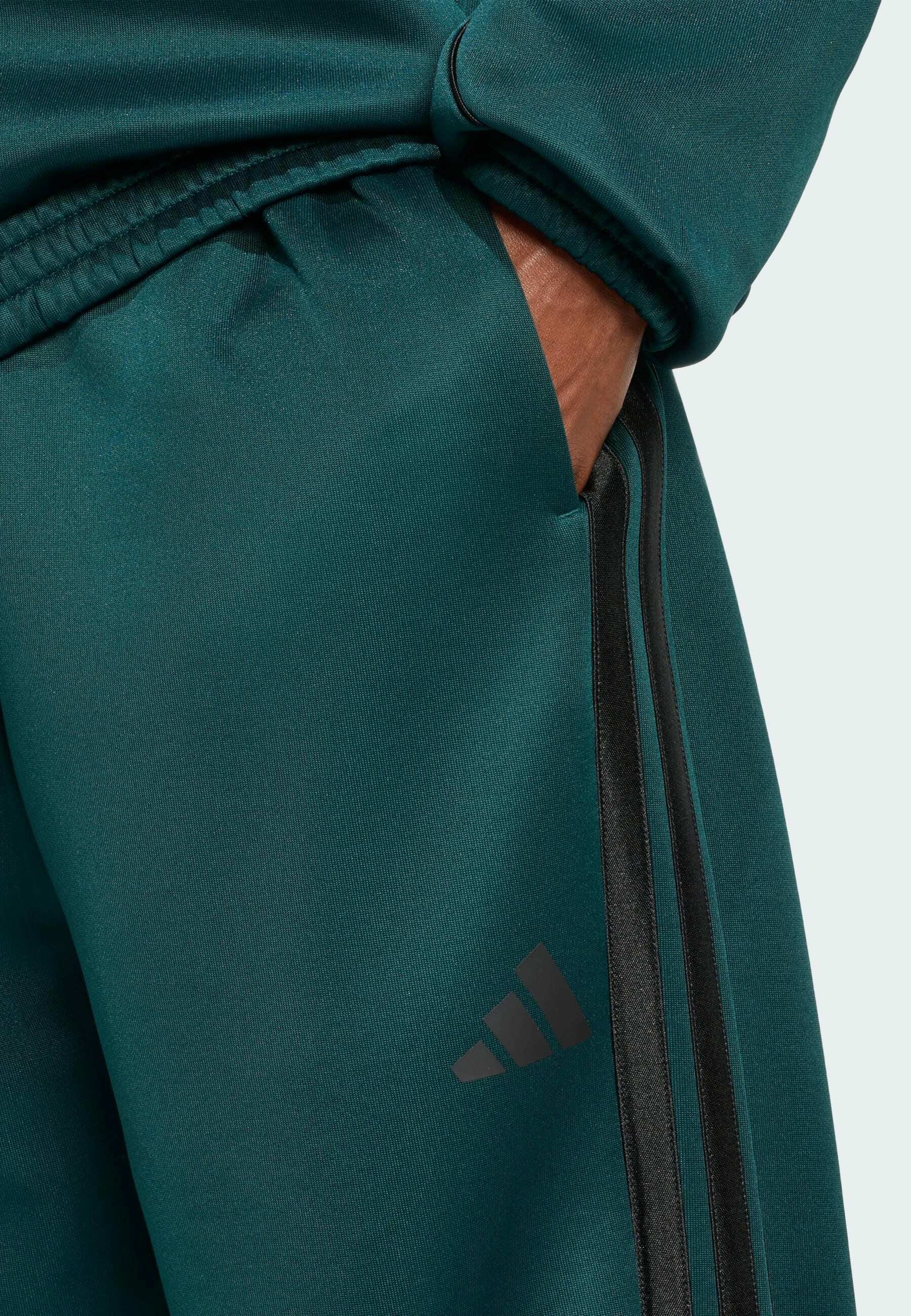 Pantaloni della tuta Adidas Sportswear - aurora ivy black