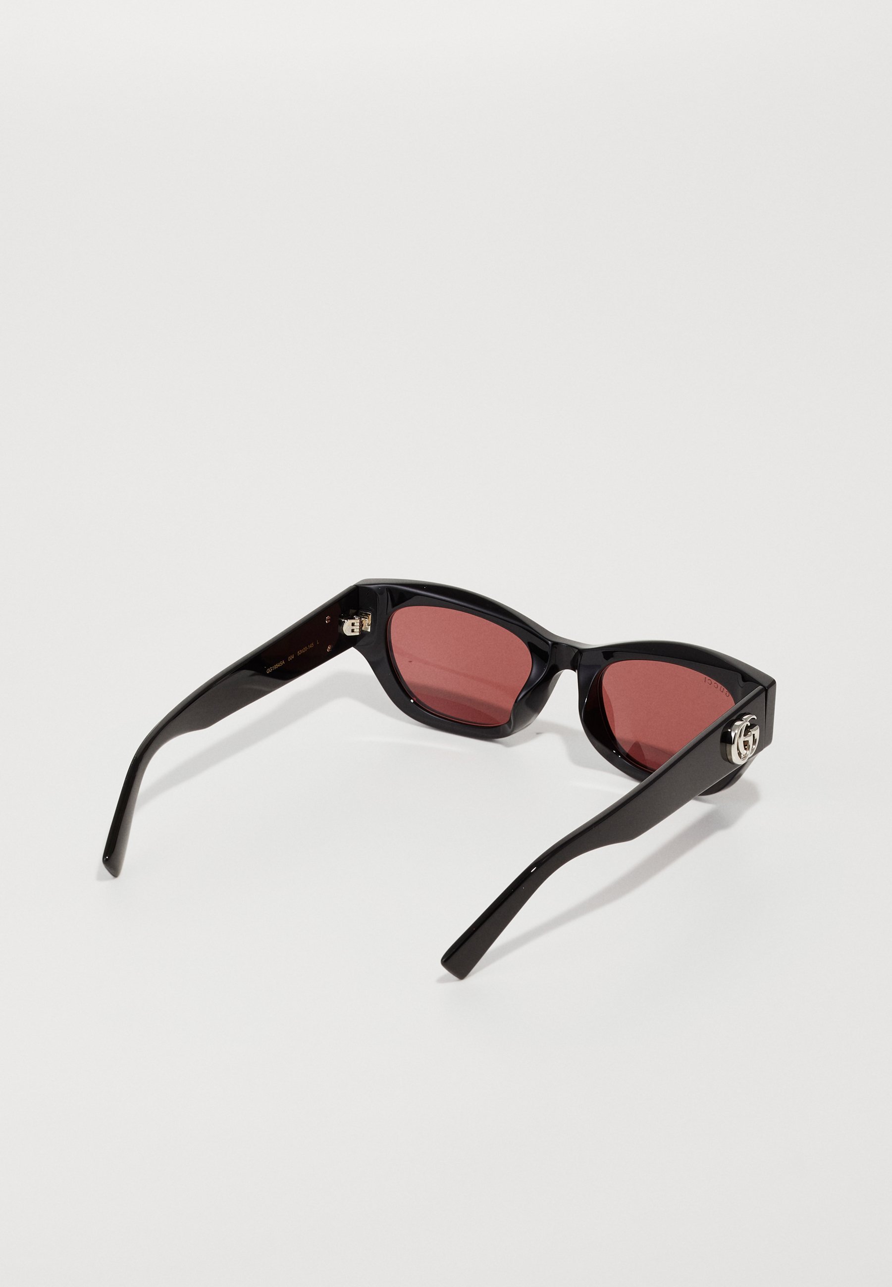 Lunettes de soleil Gucci - noir/rouge